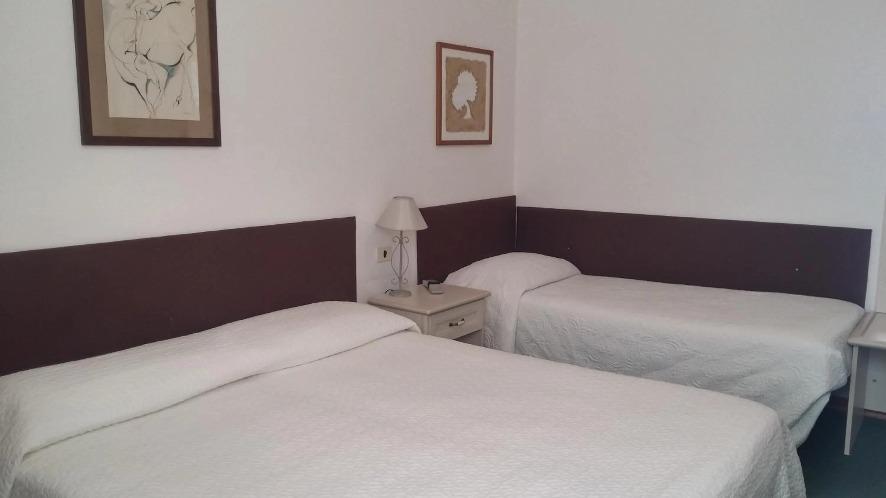 Bed in Hotel Ariston