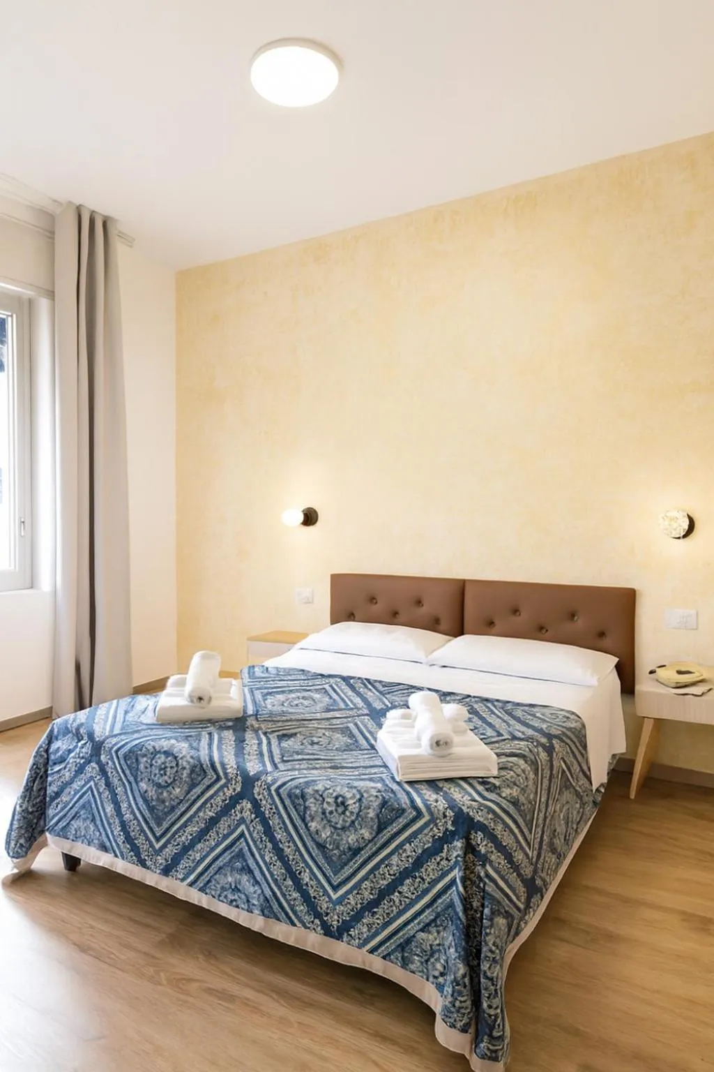 Bed in Hotel Ariston