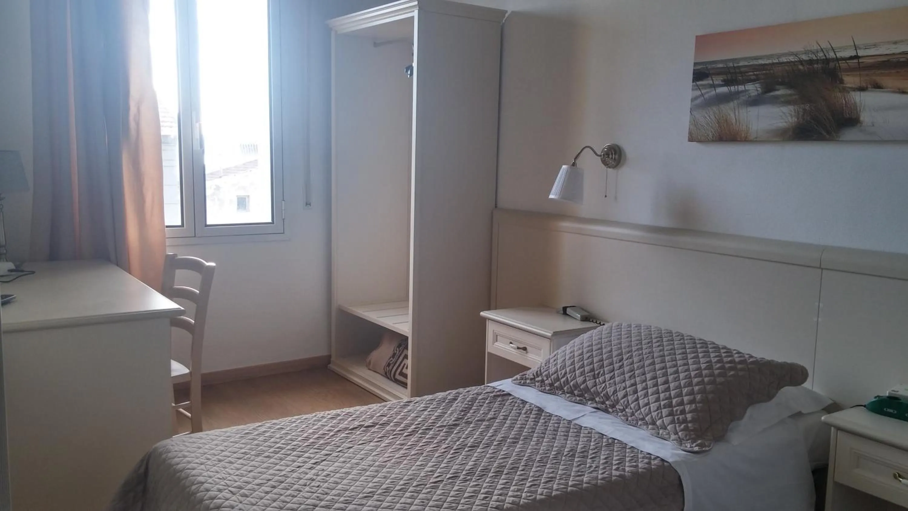 Bed in Hotel Ariston