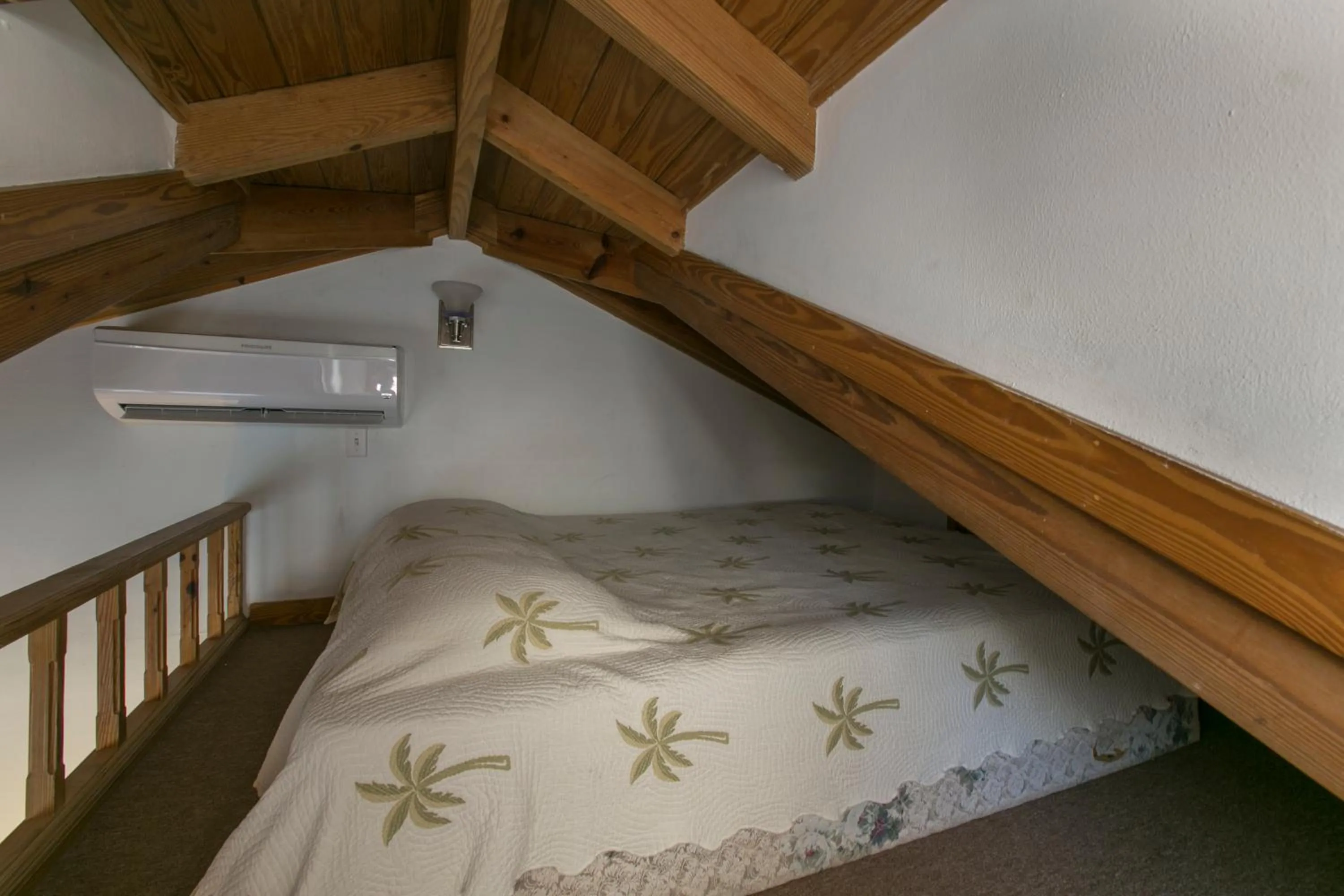 Bed in Coconut Coast Villas