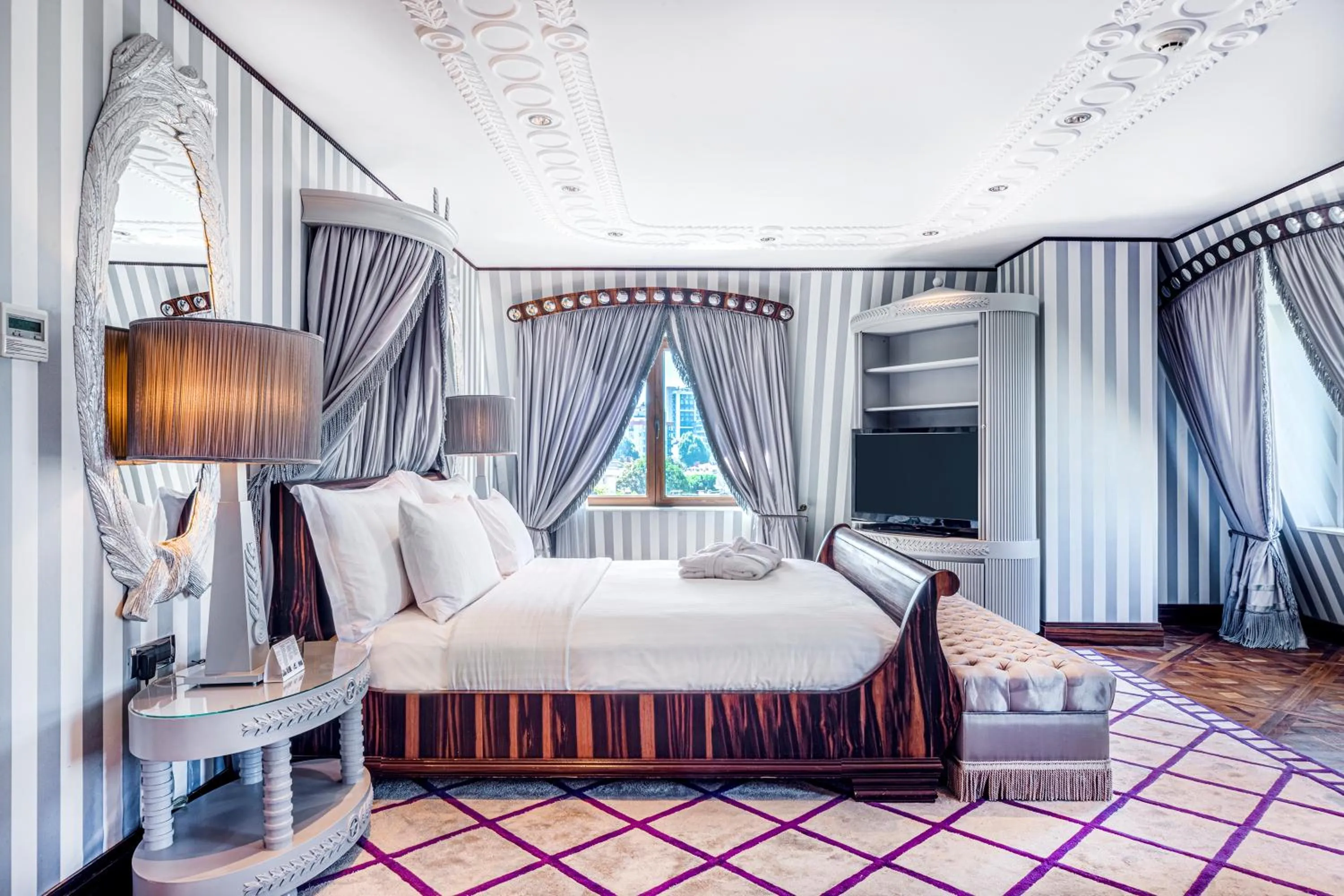 Bed in Wyndham Grand Istanbul Kalamış Marina Hotel