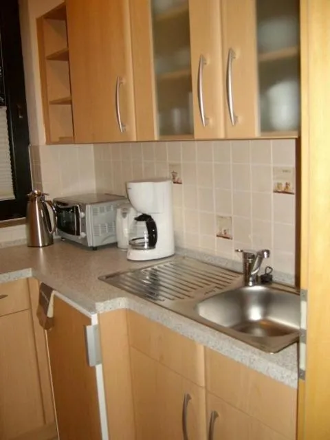 Kitchen or kitchenette in Haus Kollwitzweg - Ferienwohnungen