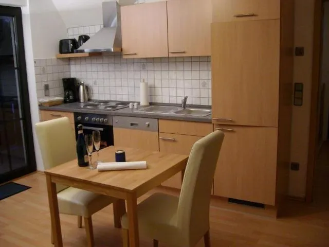 Kitchen or kitchenette in Haus Kollwitzweg - Ferienwohnungen