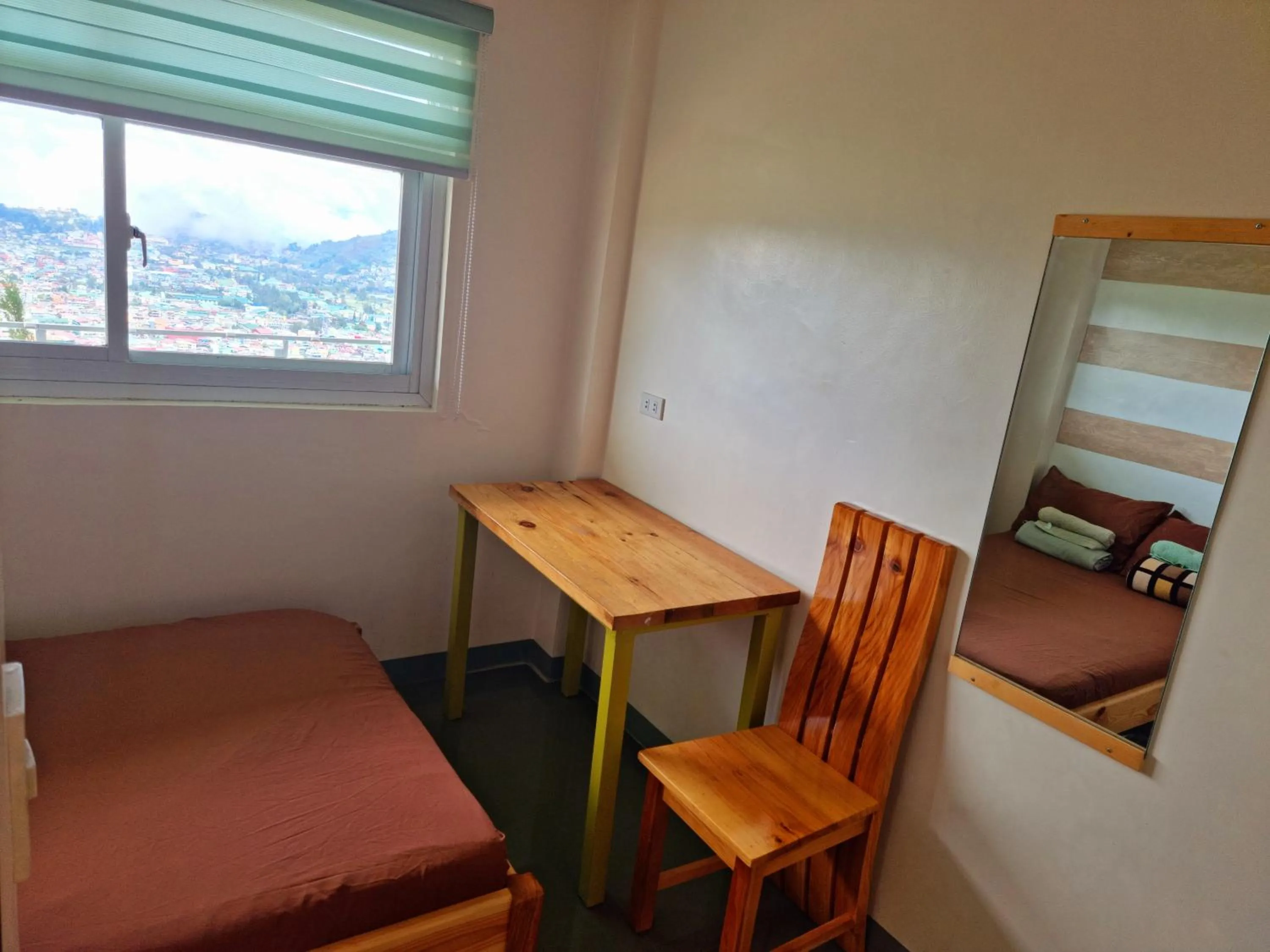 Bed in Wanay's Rocky Mountain Homestay