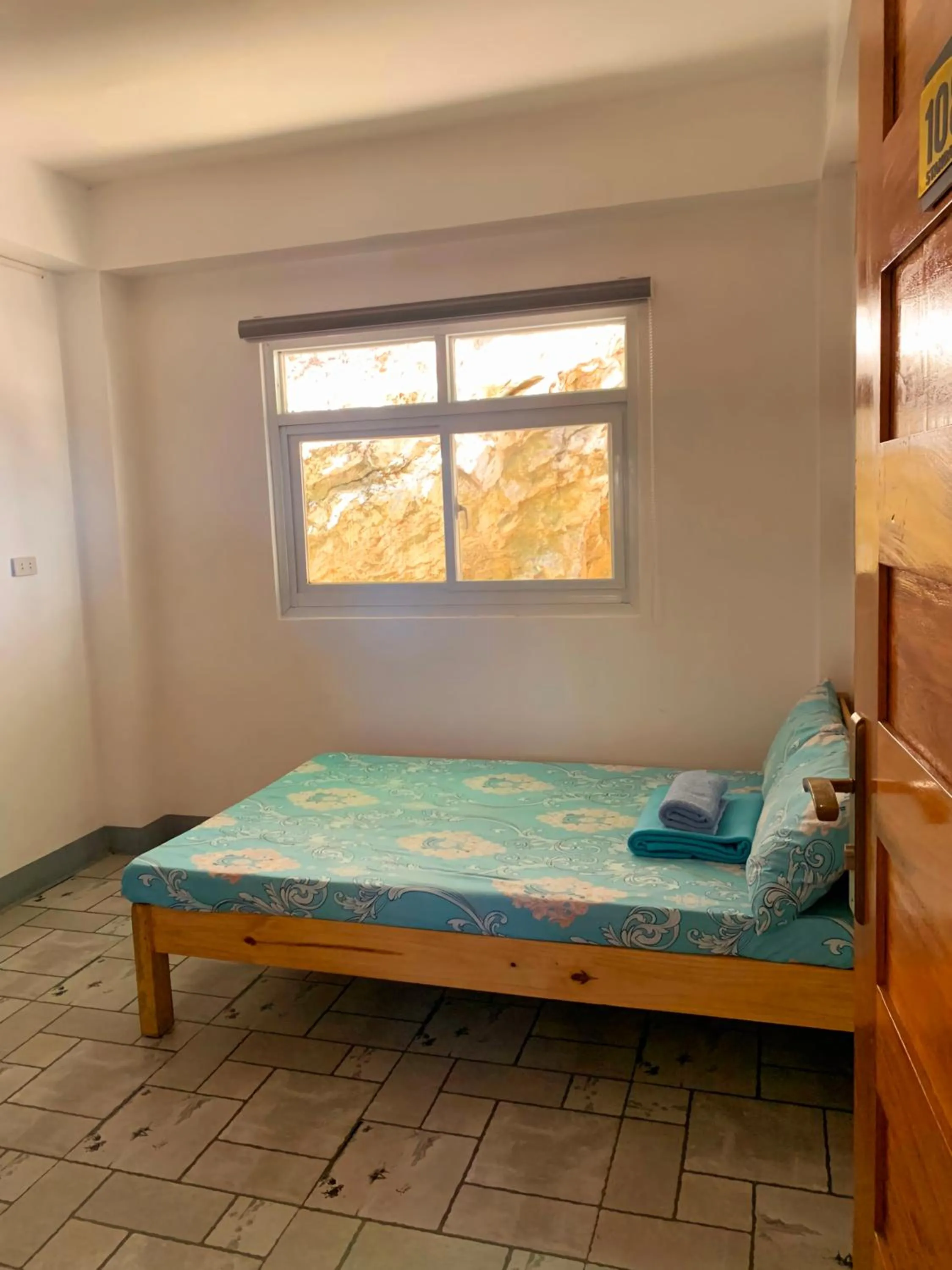 Bed in Wanay's Rocky Mountain Homestay