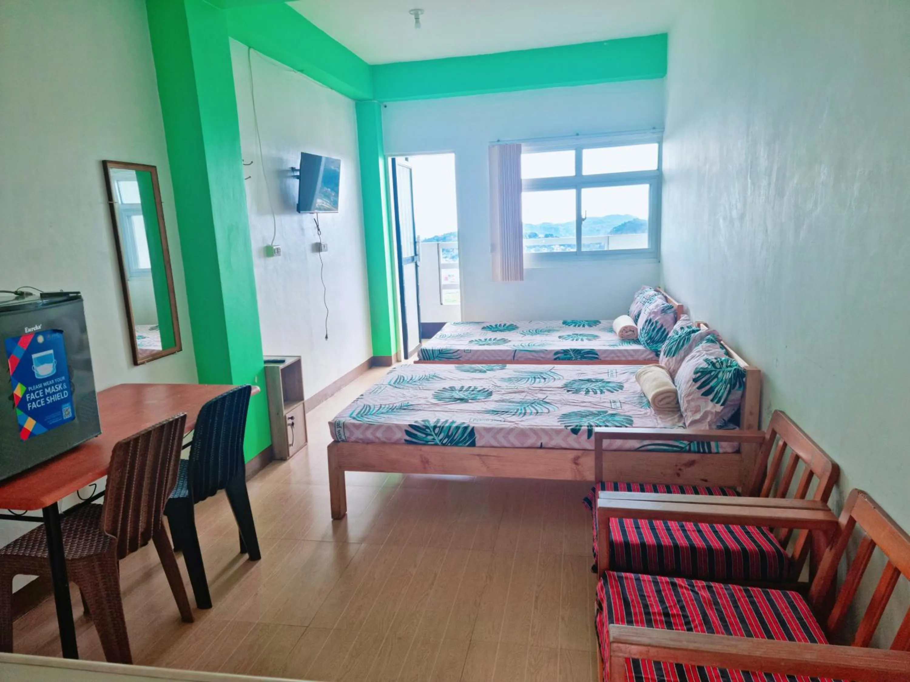 Bed in Wanay's Rocky Mountain Homestay