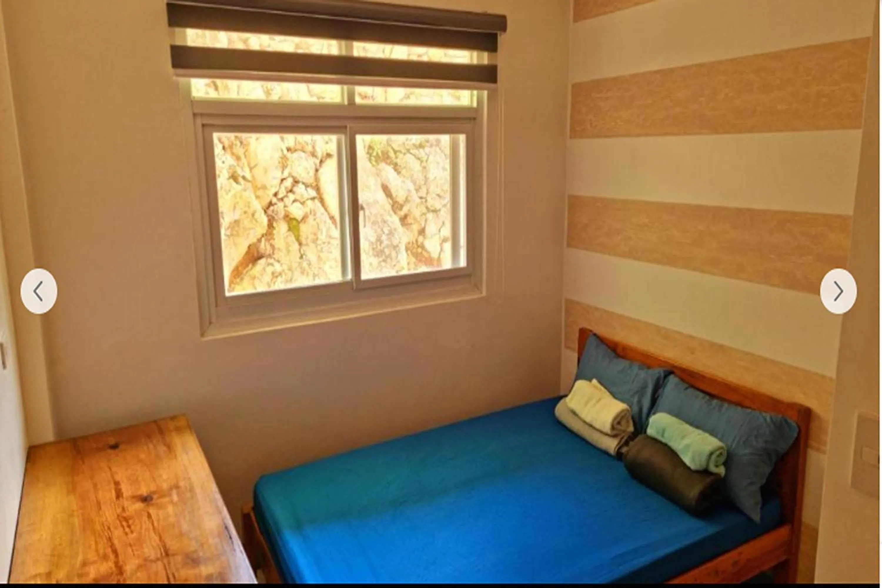 Bed in Wanay's Rocky Mountain Homestay