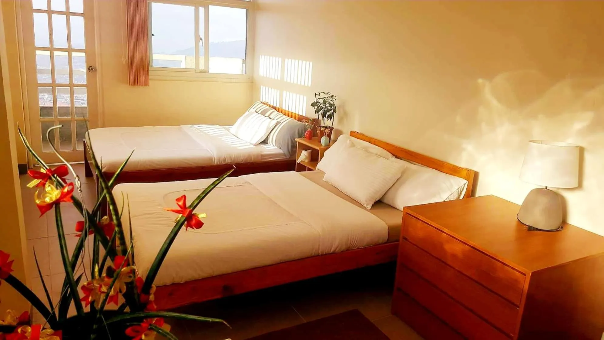 Bed in Wanay's Rocky Mountain Homestay