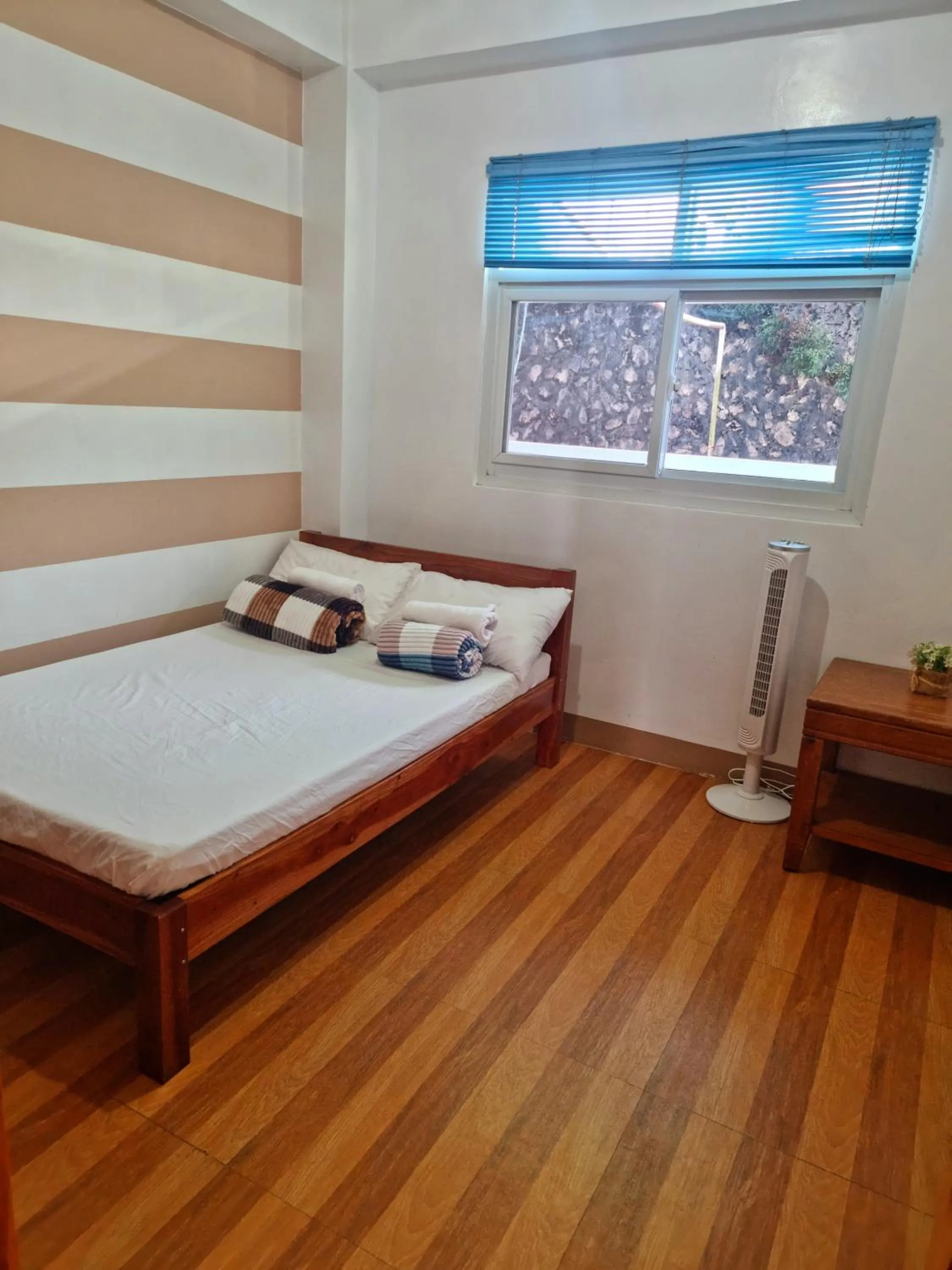 Bed in Wanay's Rocky Mountain Homestay