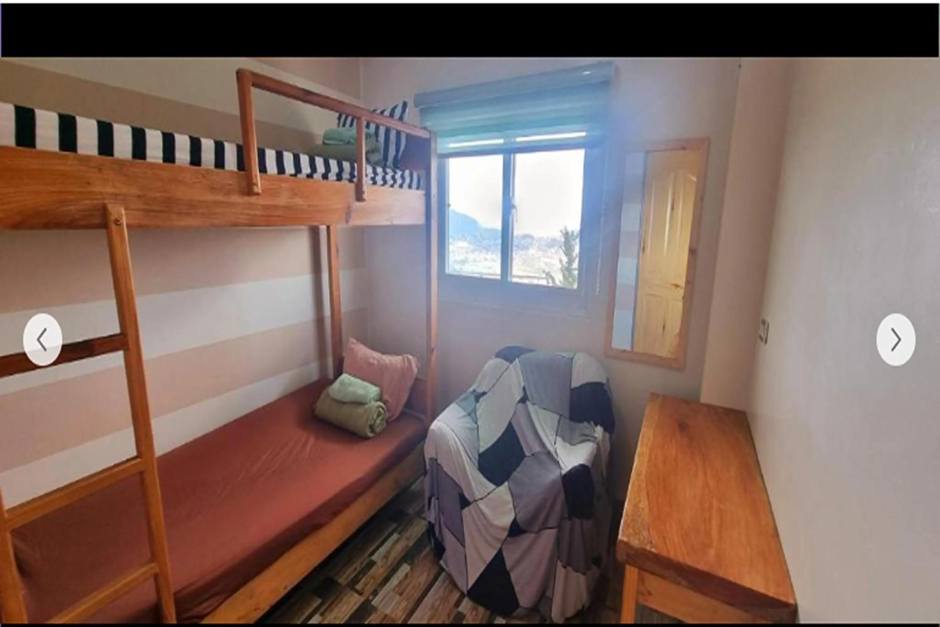 Bed in Wanay's Rocky Mountain Homestay