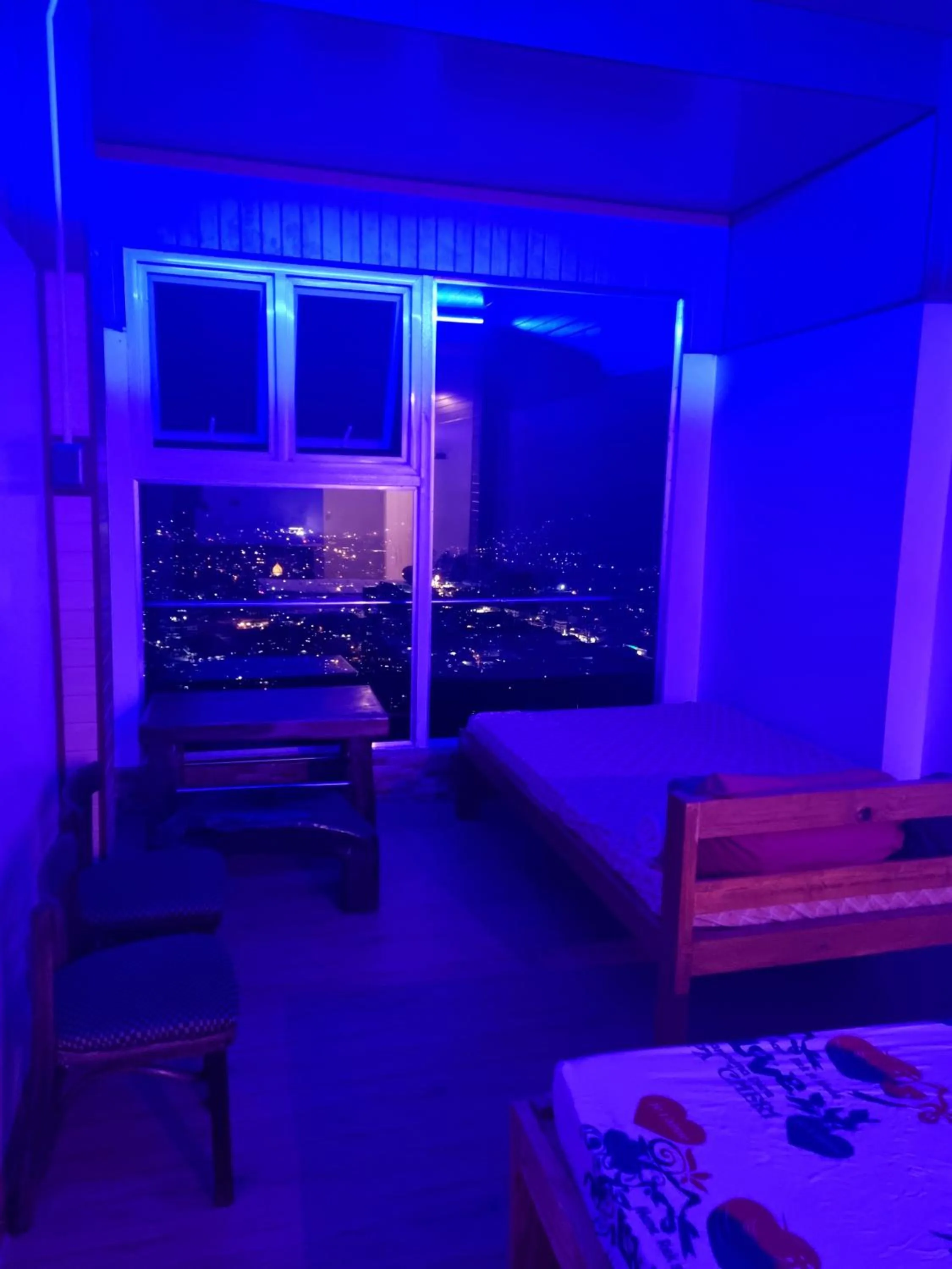 Bed in Wanay's Rocky Mountain Homestay