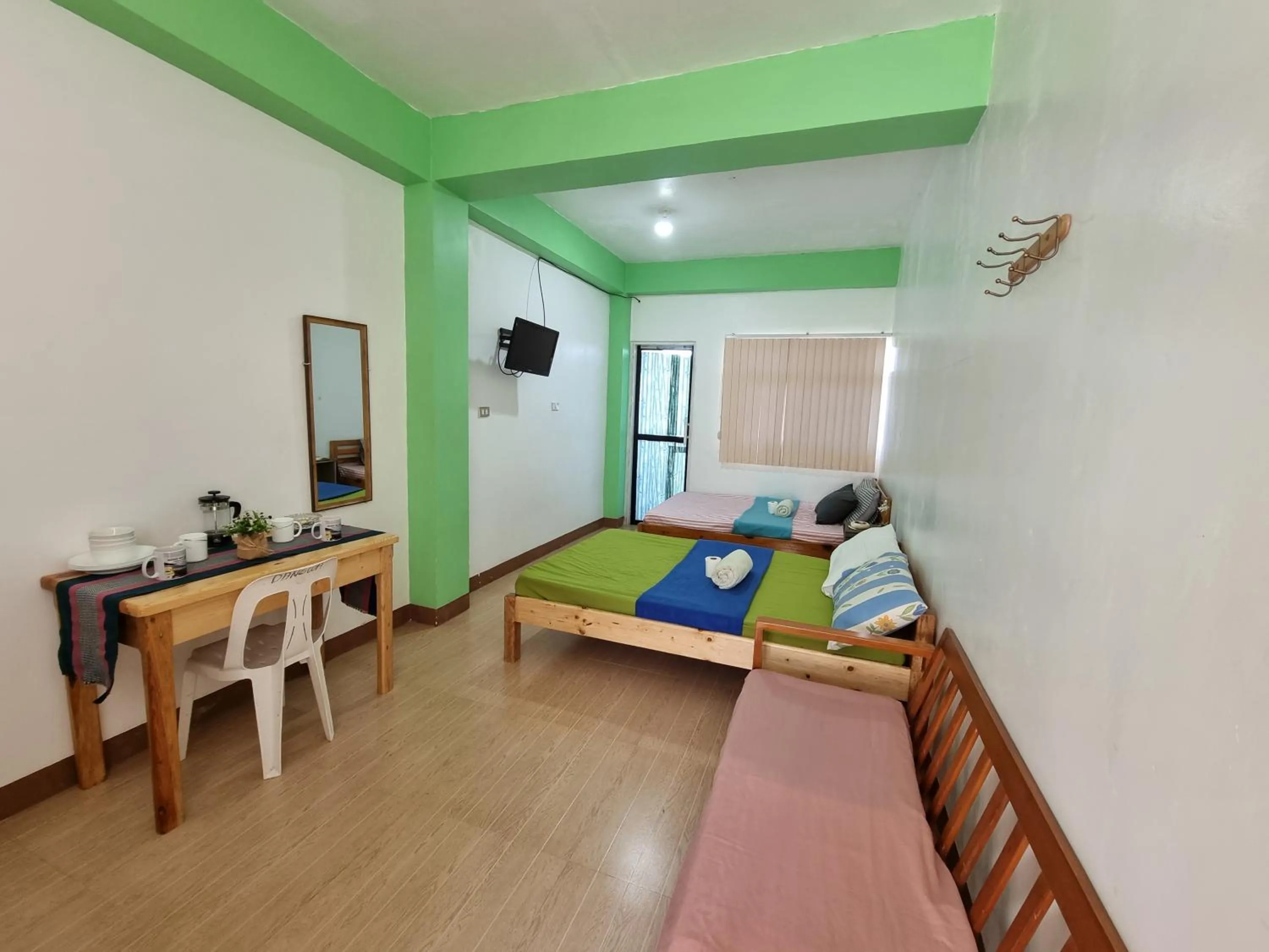 Bed in Wanay's Rocky Mountain Homestay