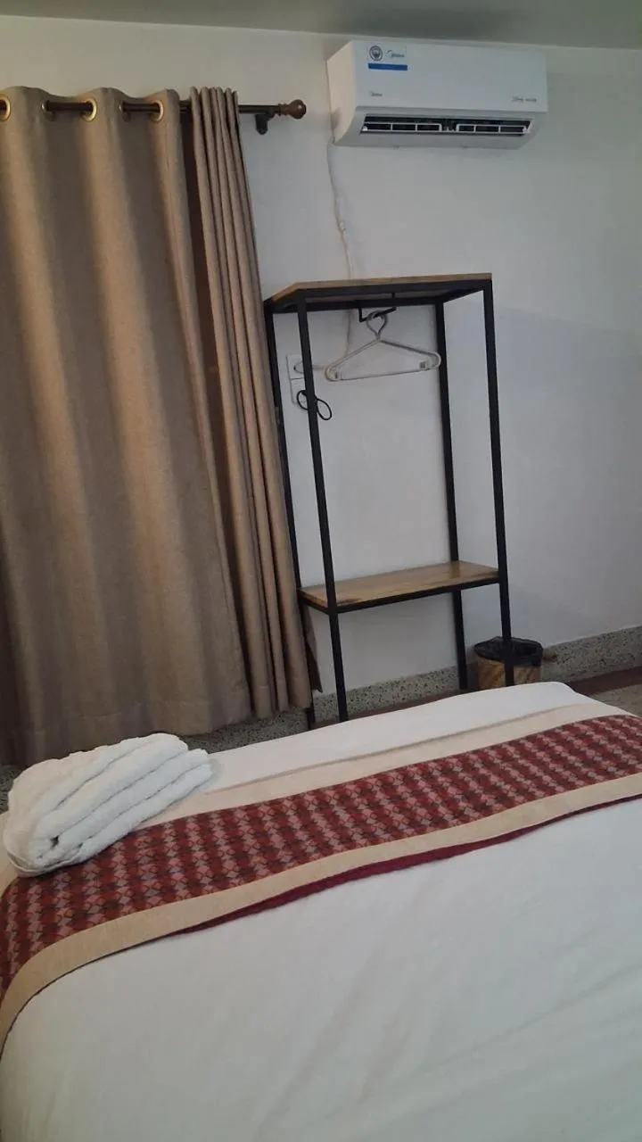 Bed in Pacific Guest House