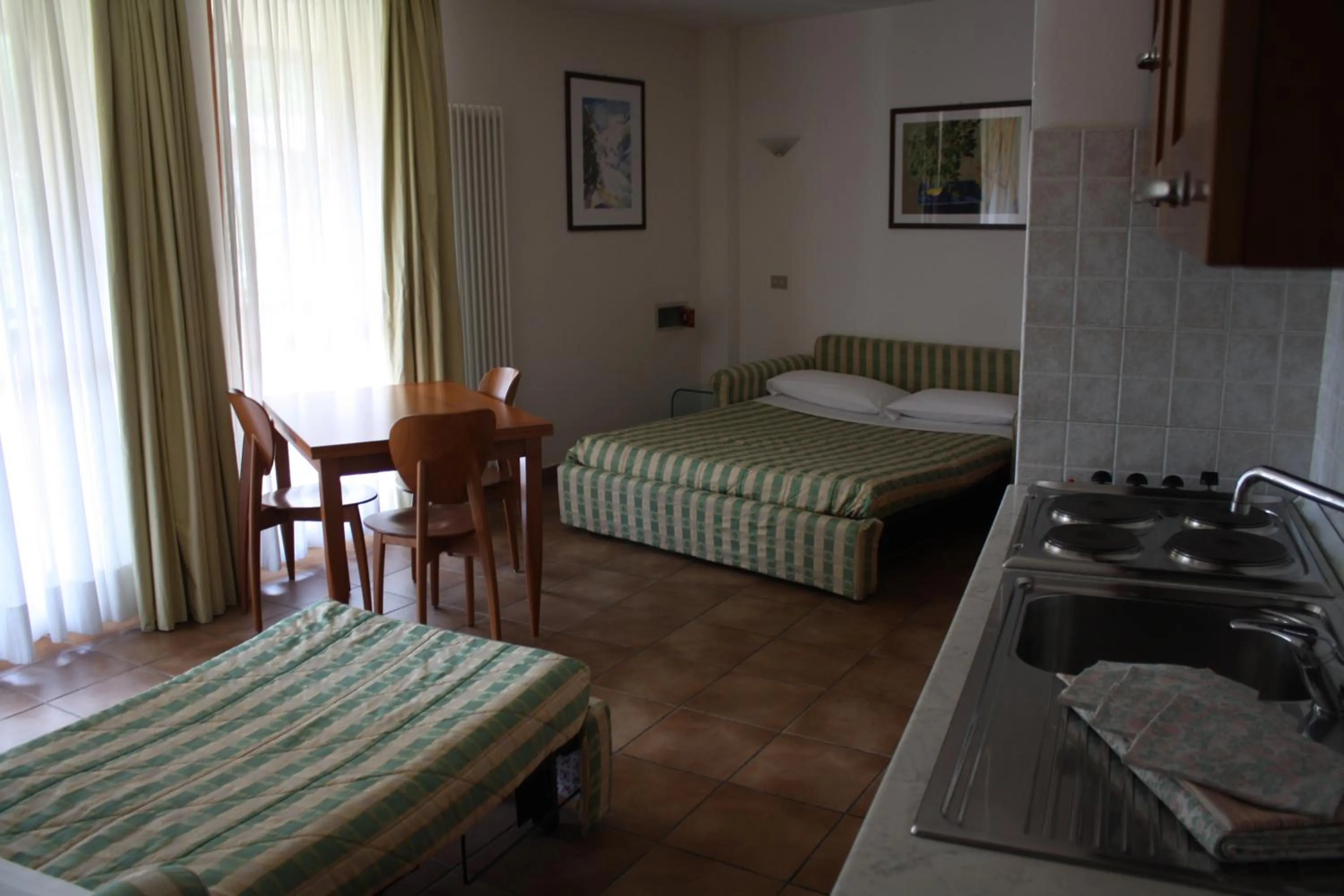 Living room, Bed in Residence Campo Smith