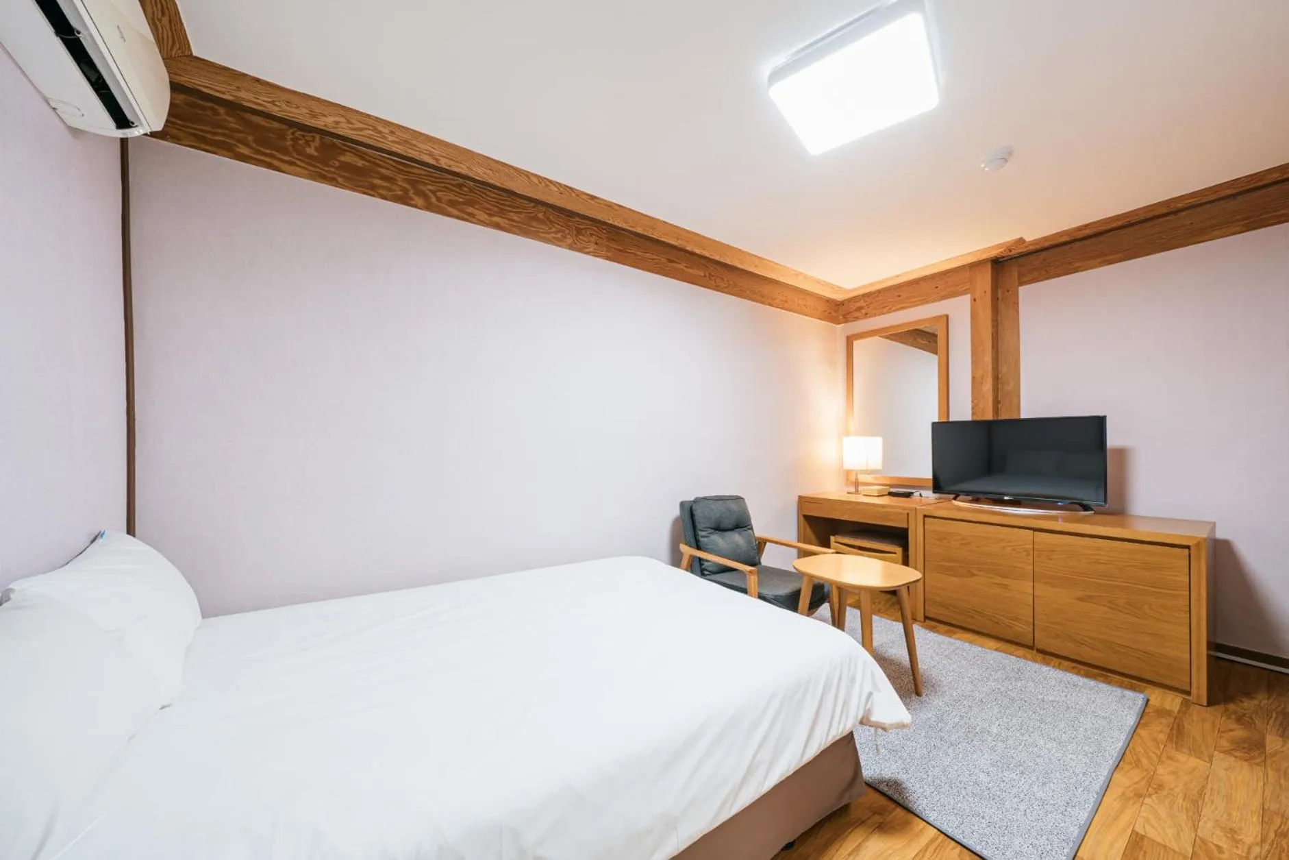 Bed in Jeju Miracle Hotel