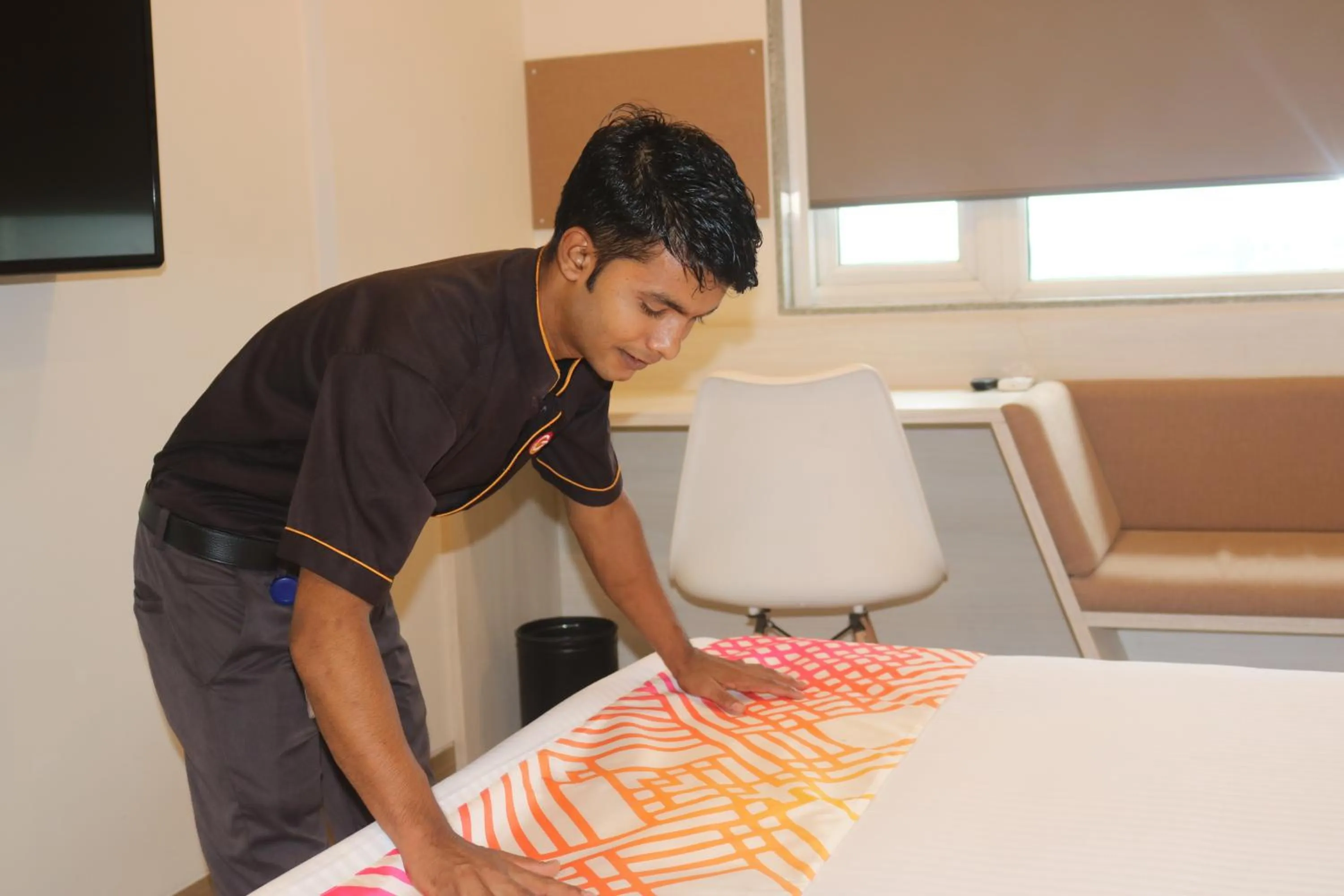 Staff in Ginger Sanand