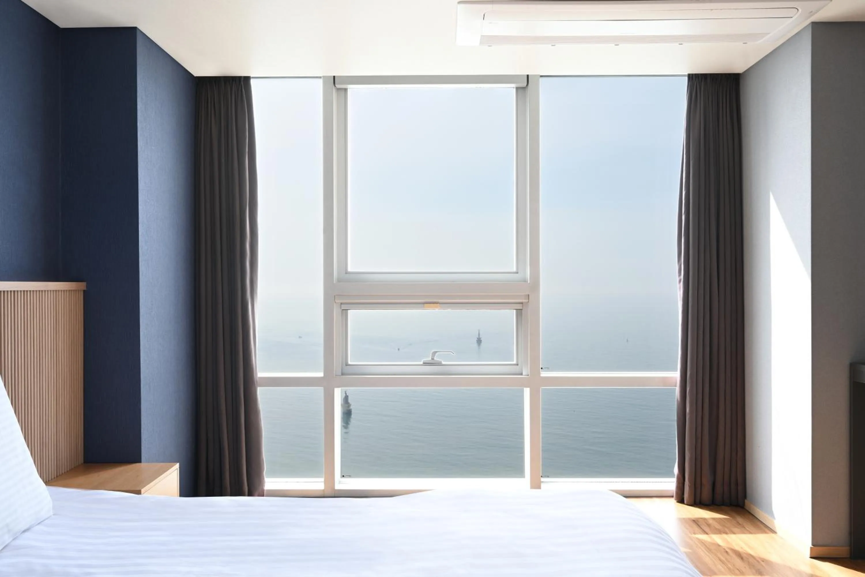 Sea view, Bed in Kolon Seacloud Hotel
