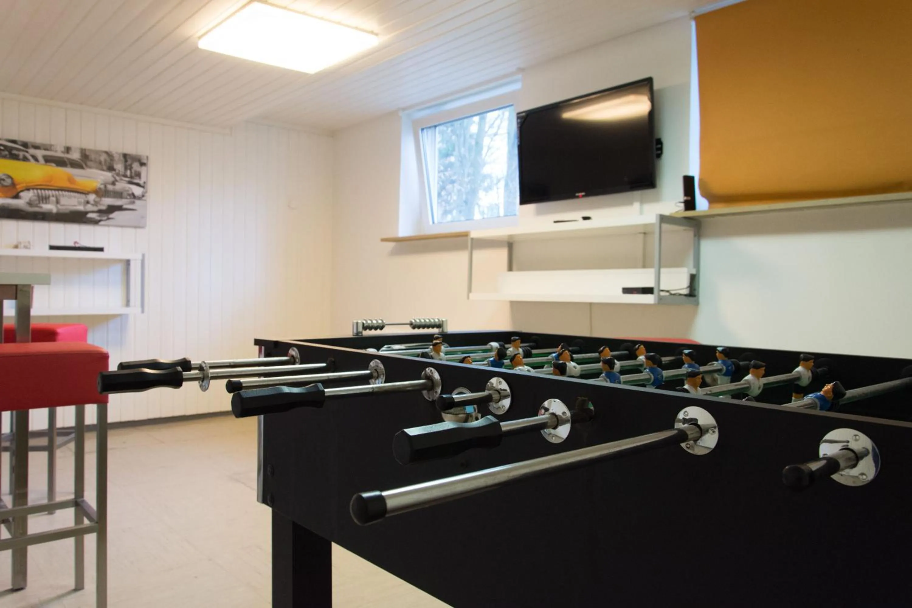 Communal lounge/ TV room in 1, 2, sleep Hostel Nürnberg Messe