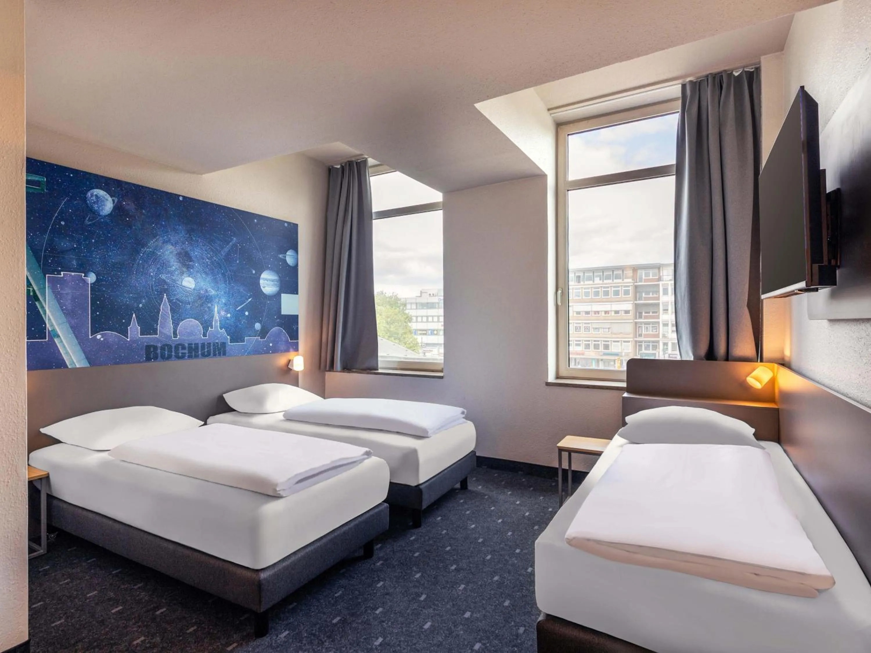 Photo of the whole room, Bed in B&B HOTEL Bochum Hbf-Nord