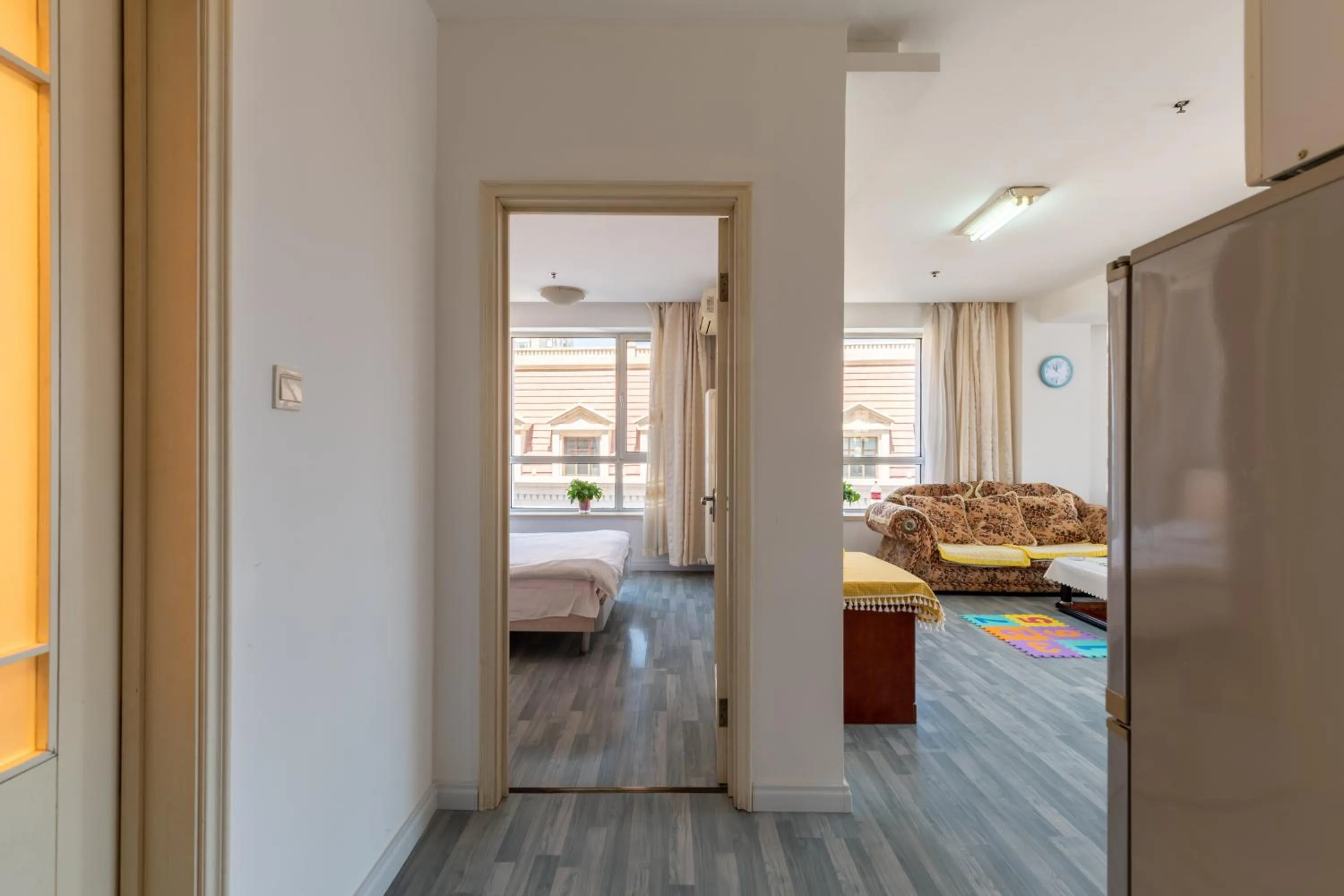 View (from property/room), Bed in Dalian Xiuzhu Mansion Apartment