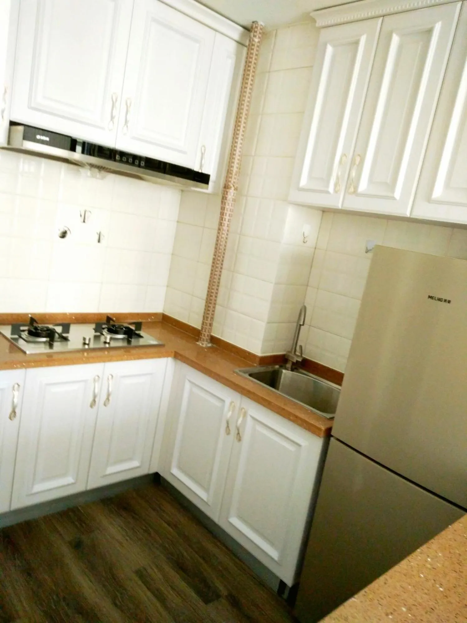 Kitchen or kitchenette in Dalian Xiuzhu Mansion Apartment