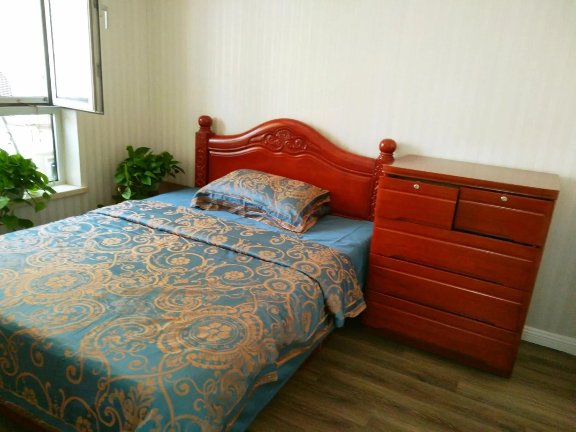 Bedroom, Bed in Dalian Xiuzhu Mansion Apartment