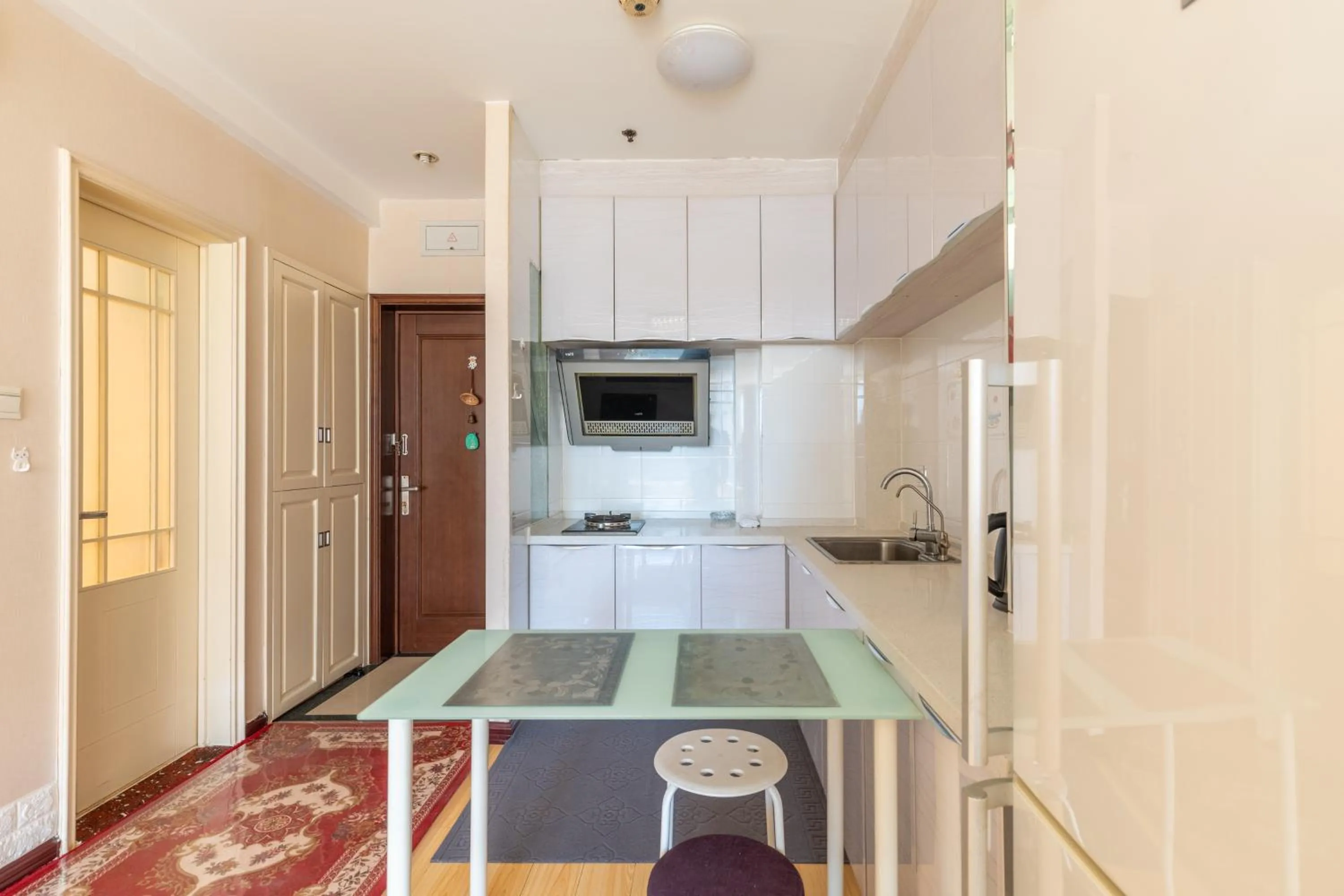 Kitchen or kitchenette in Dalian Xiuzhu Mansion Apartment