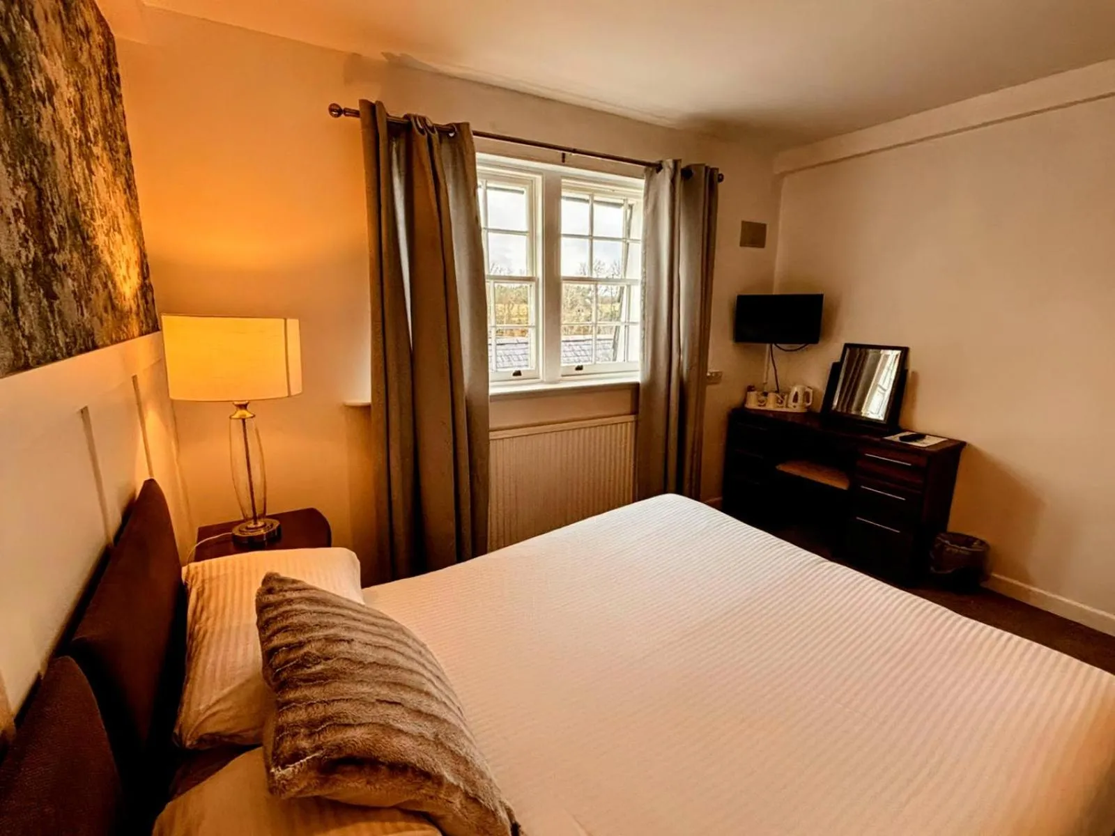 Bed in The Mill House Hotel