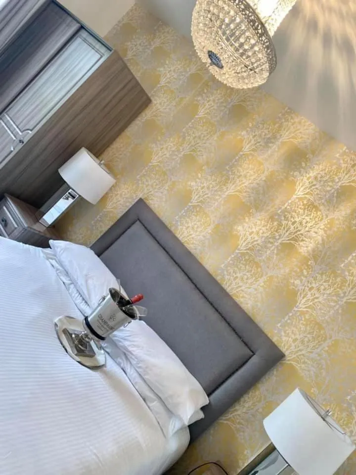 Bed in The Mill House Hotel