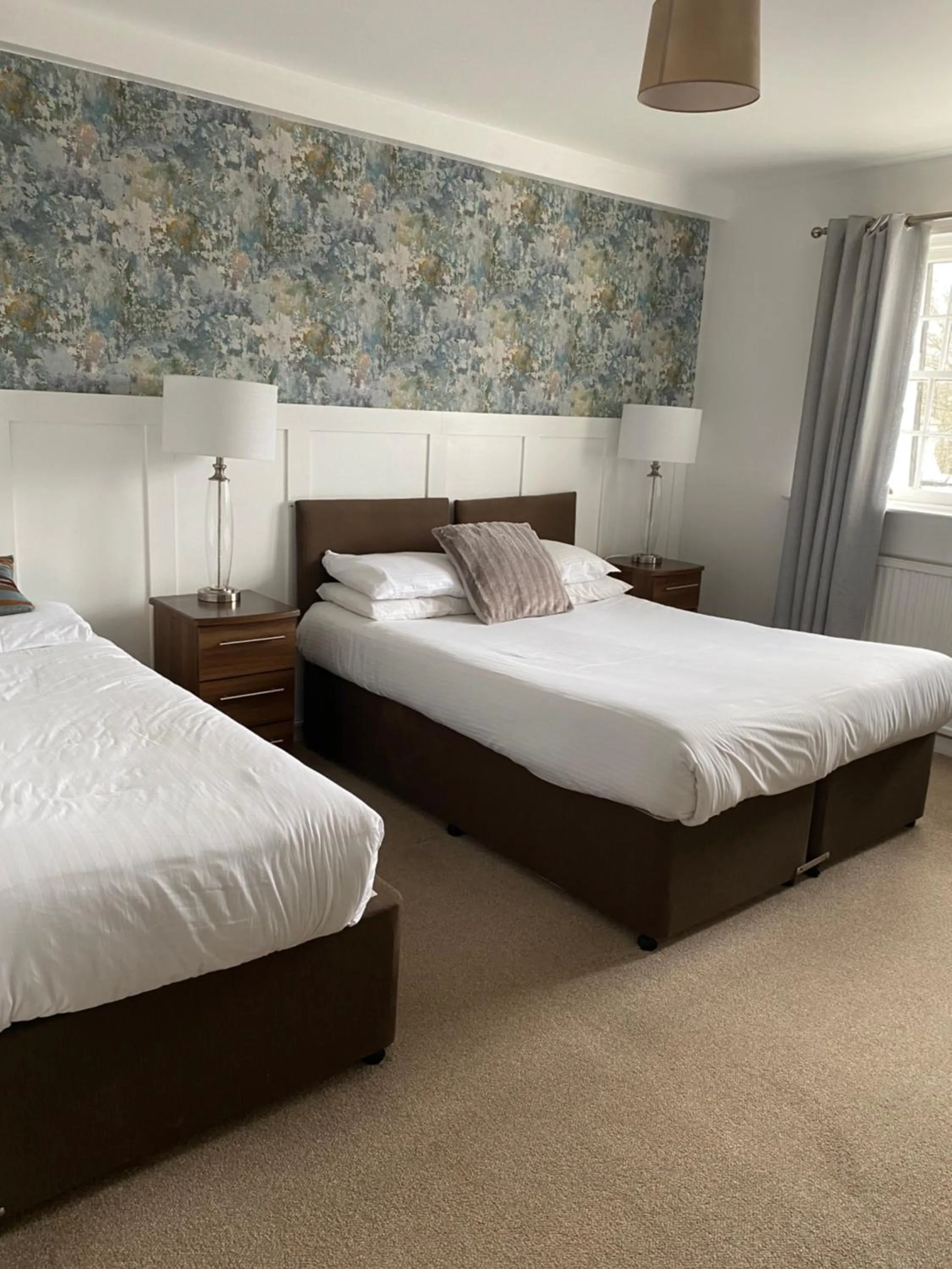 Bed in The Mill House Hotel