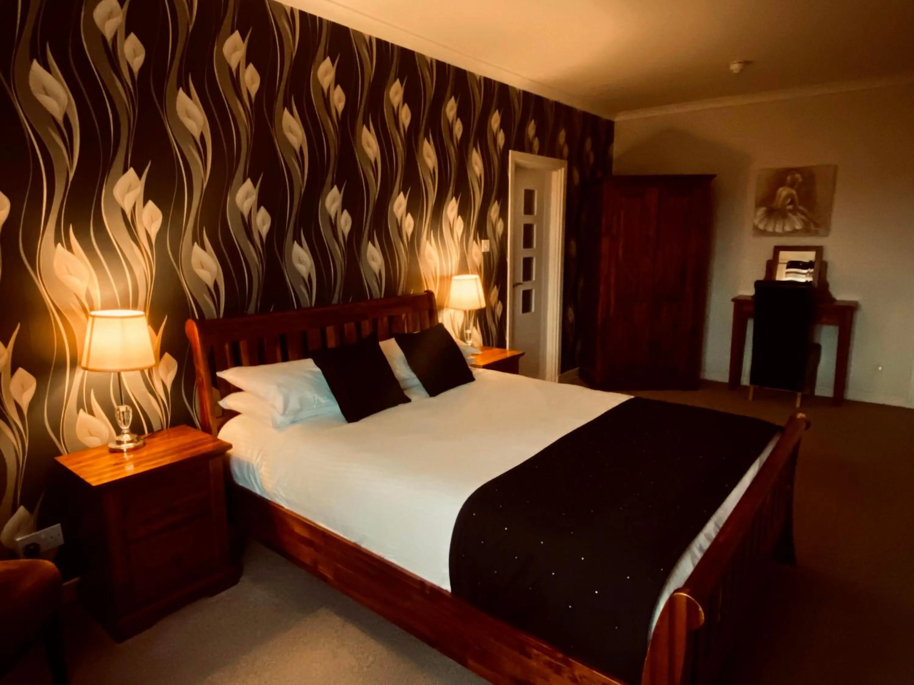Bed in The Mill House Hotel