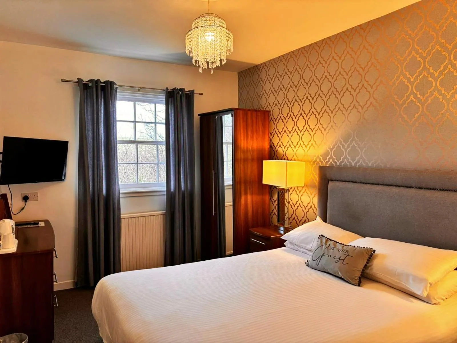 Bed in The Mill House Hotel