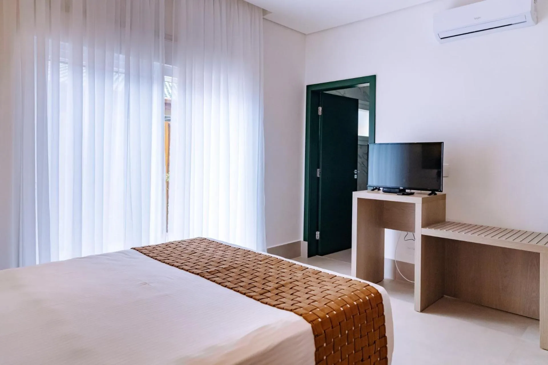 Bed in Vistabela Resort & Spa