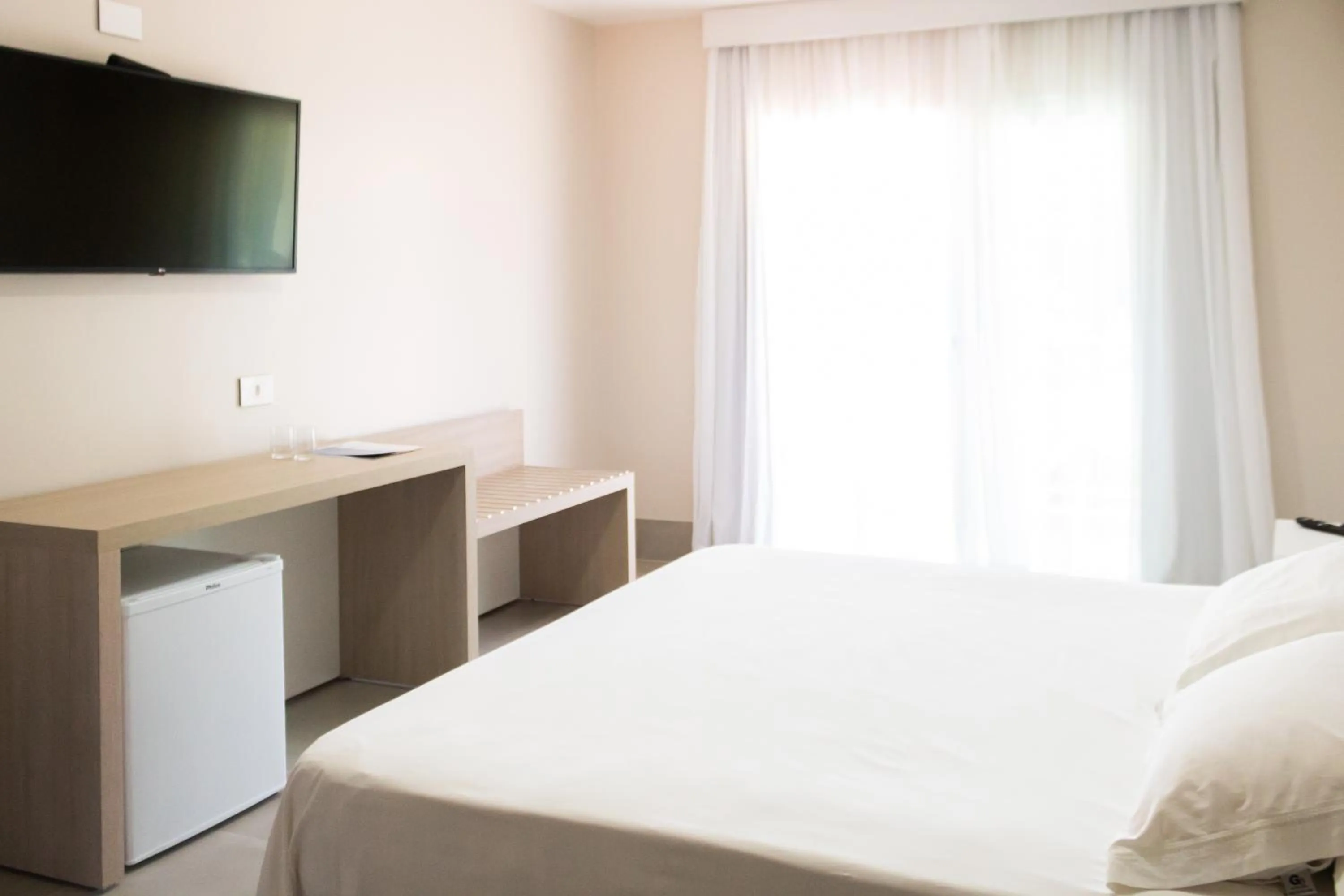 Bed in Vistabela Resort & Spa