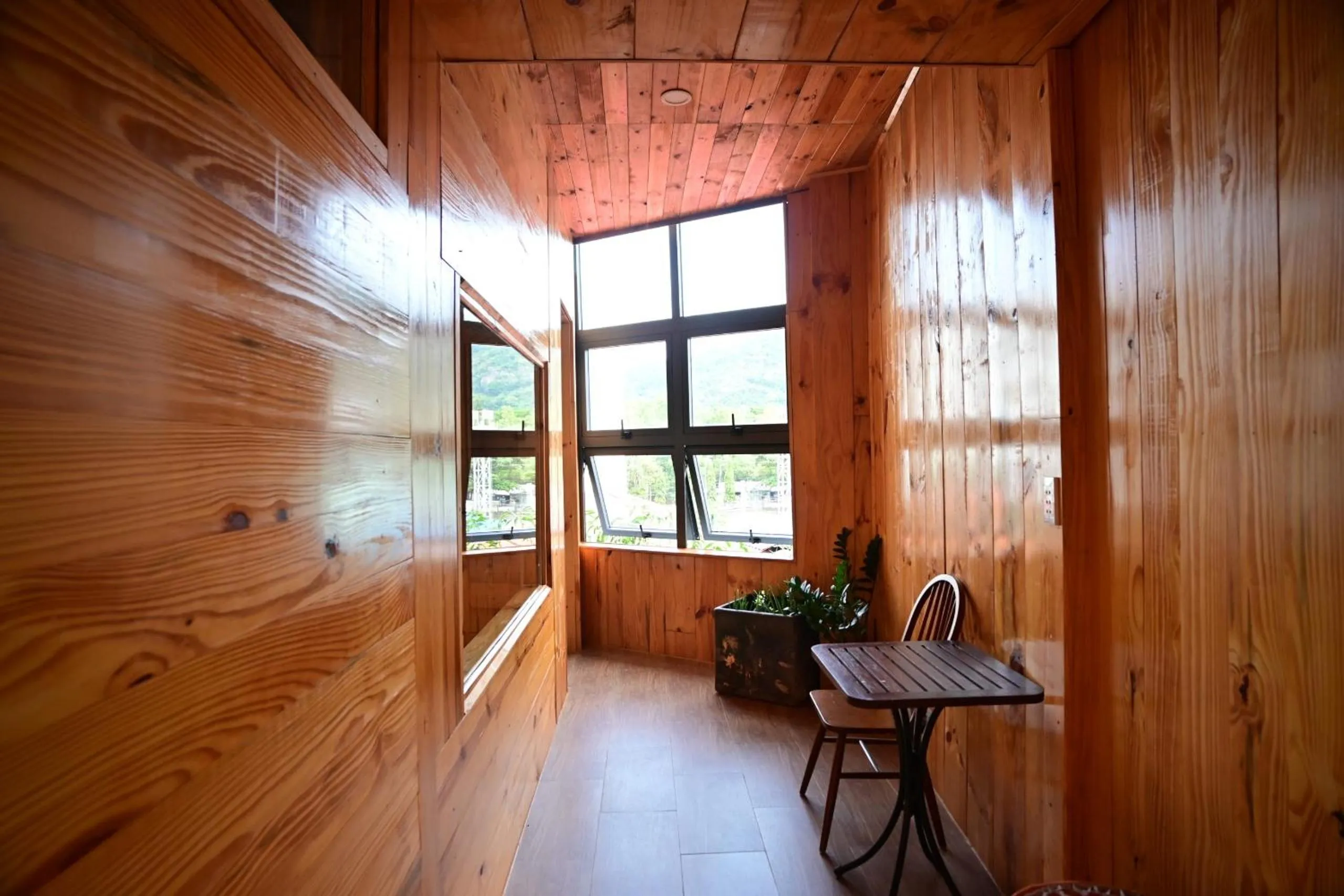 Communal lounge/ TV room in Little Home Homestay