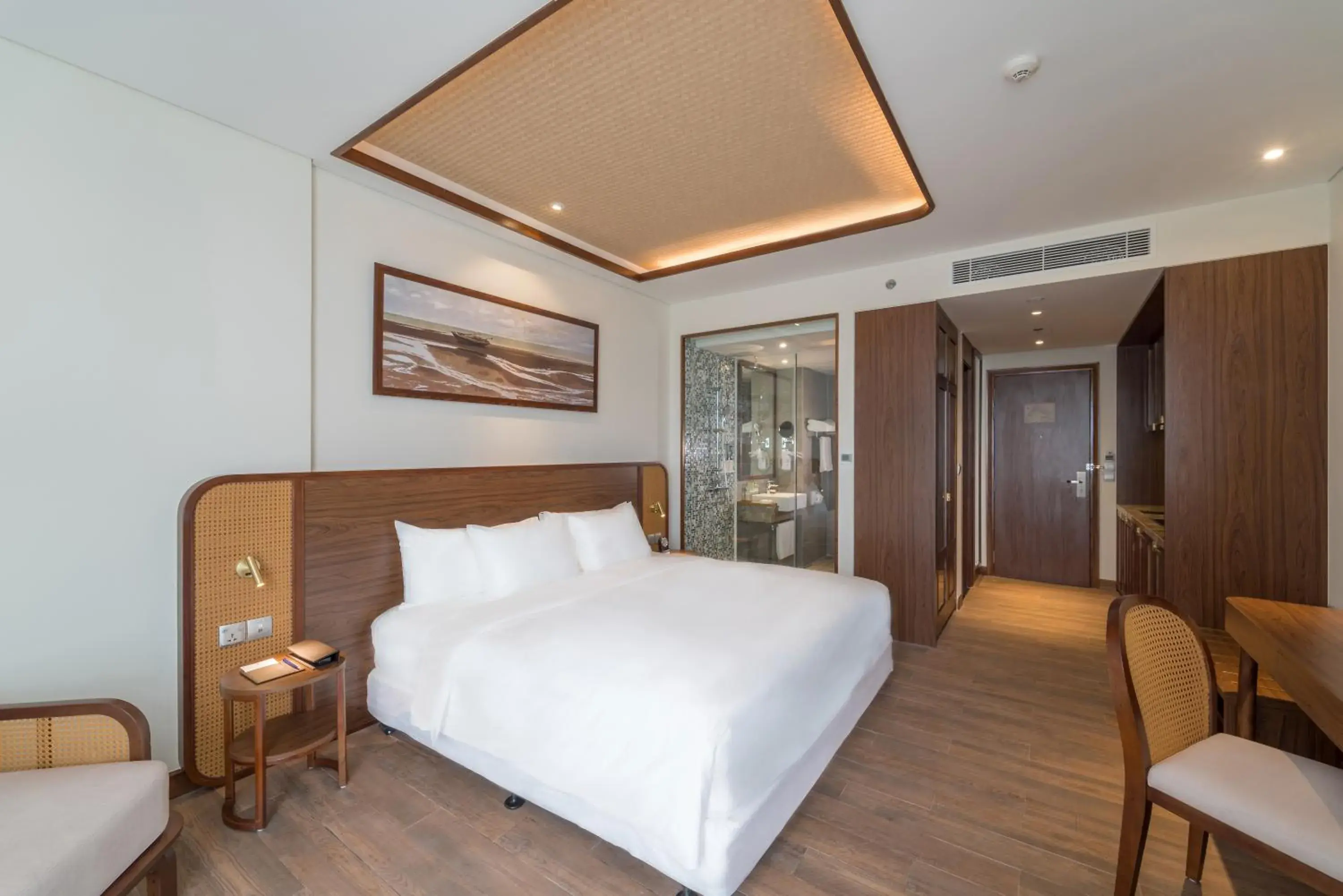 Deluxe King Room with Balcony and Pool View in Best Western Premier Sonasea Phu Quoc Deluxe King Room with Balcony and Pool View in Best Western Premier Sonasea Phu Quoc