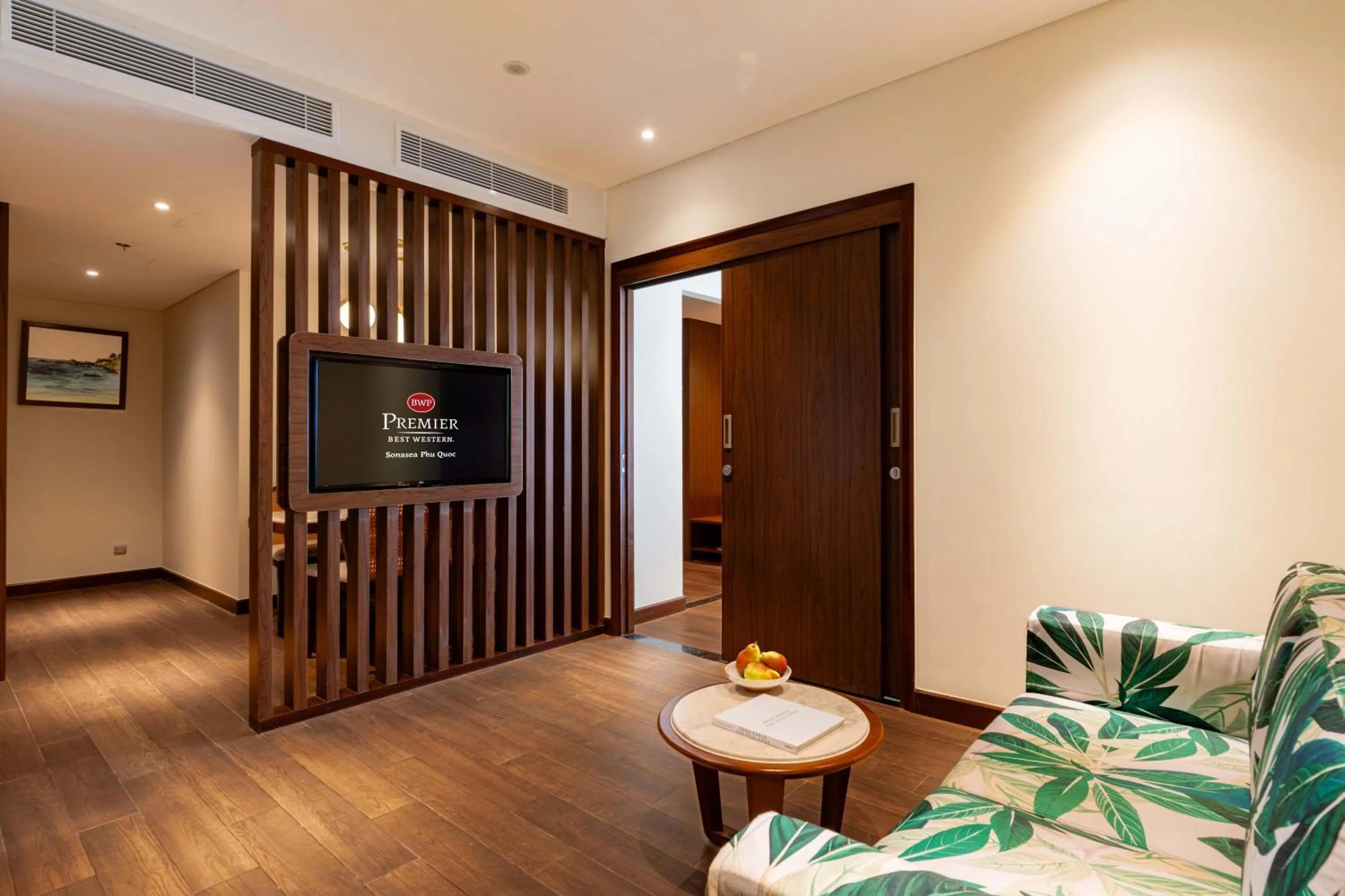 Living room, Bed in Best Western Premier Sonasea Phu Quoc