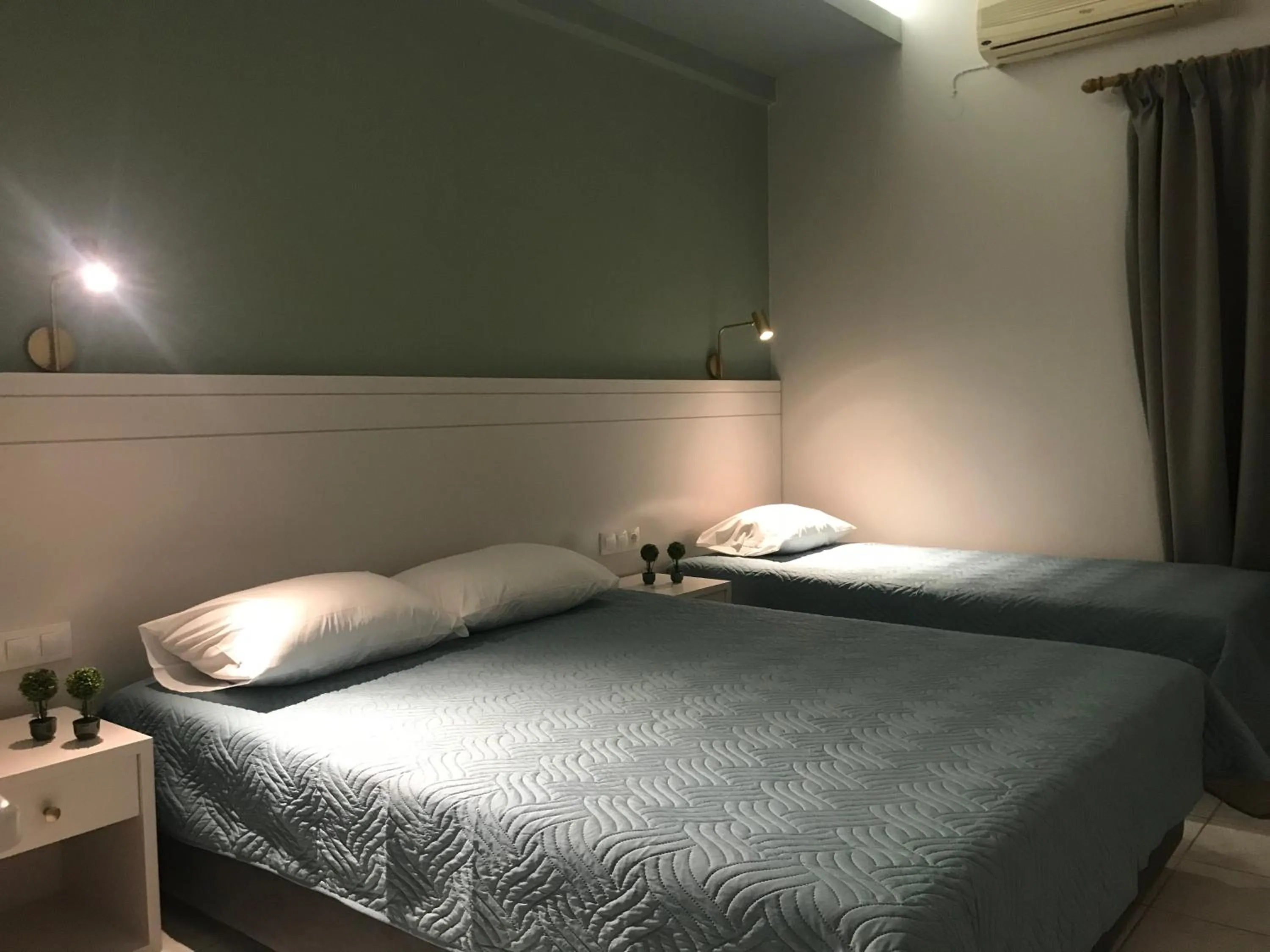 Bed in George Deluxe Apartments