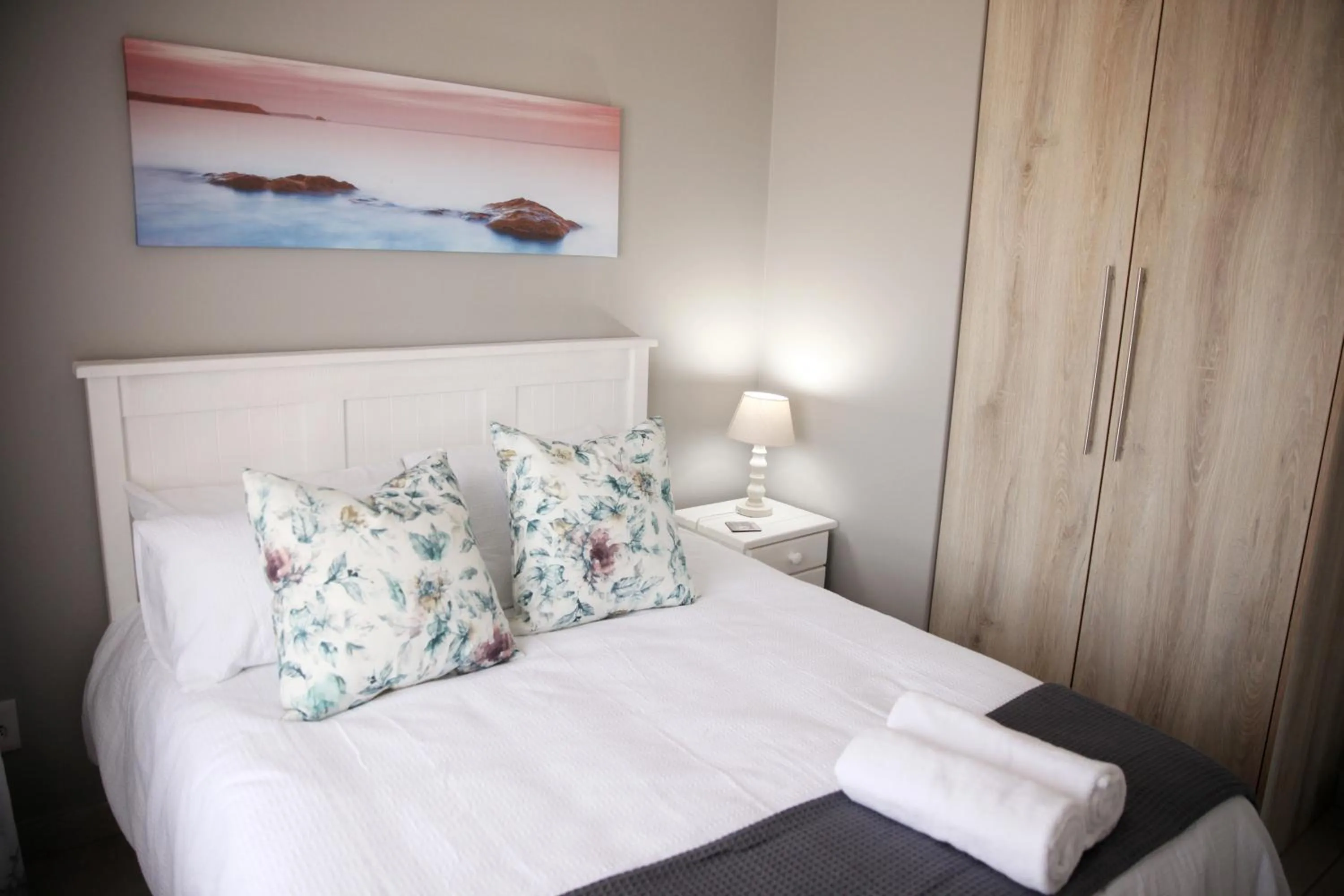 Bed in Mari-Amor Self-Catering Apartments