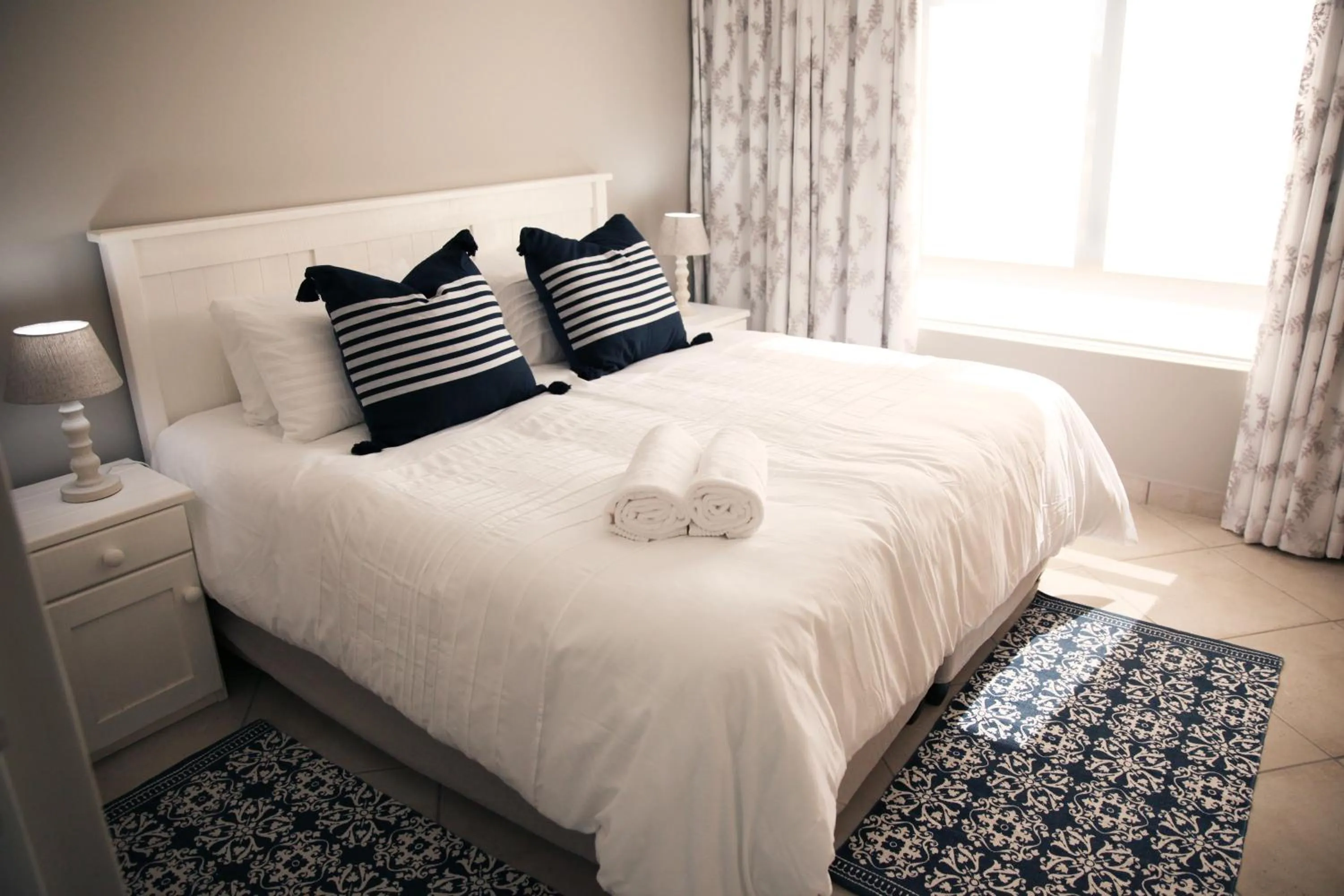 Bed in Mari-Amor Self-Catering Apartments