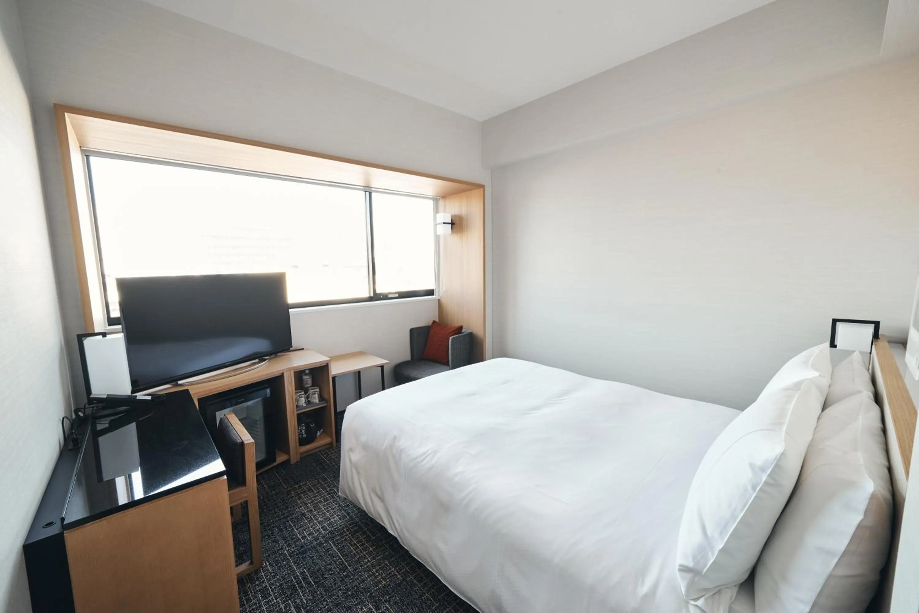 Bed in Richmond Hotel Premier Kyoto Ekimae