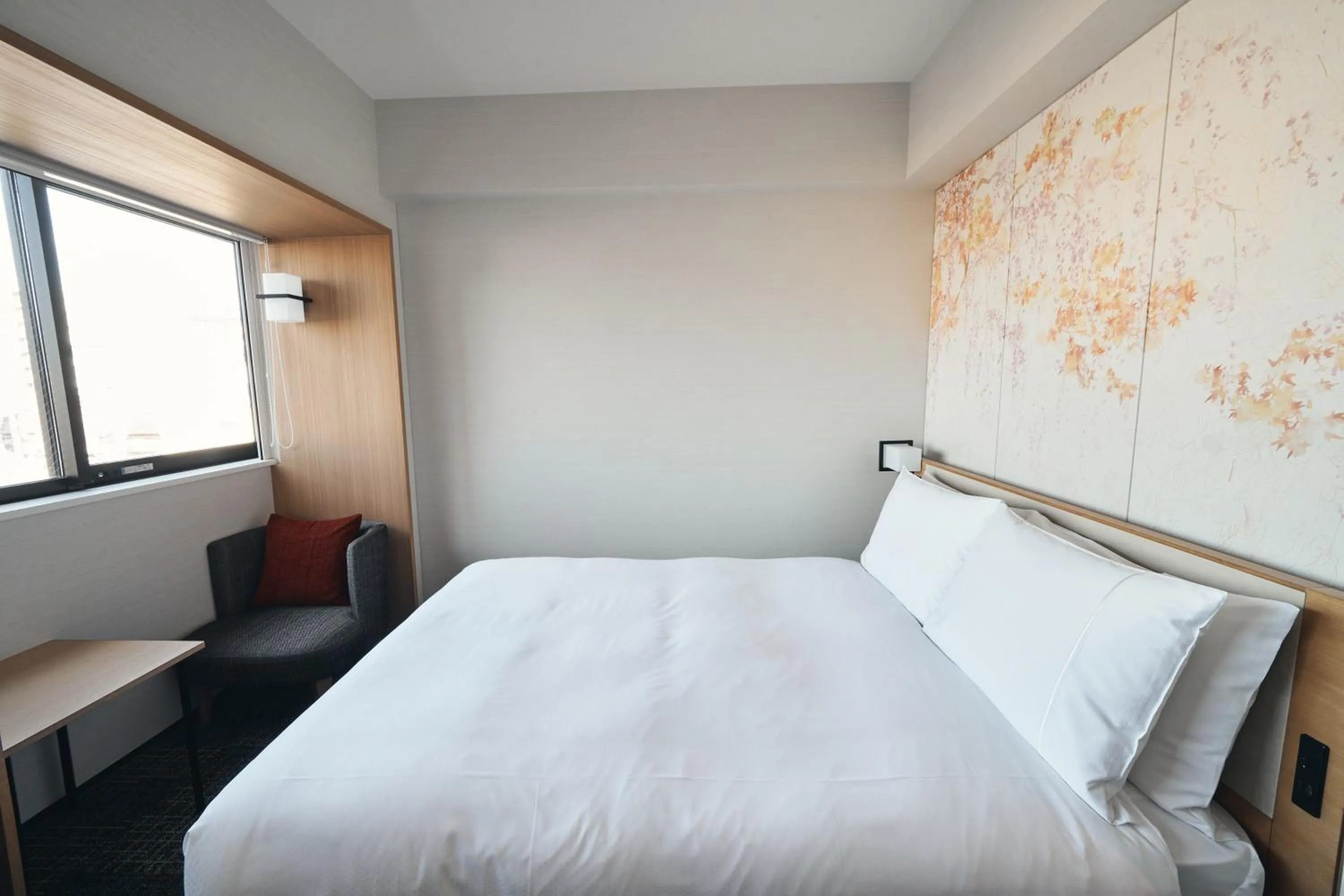 Bed in Richmond Hotel Premier Kyoto Ekimae