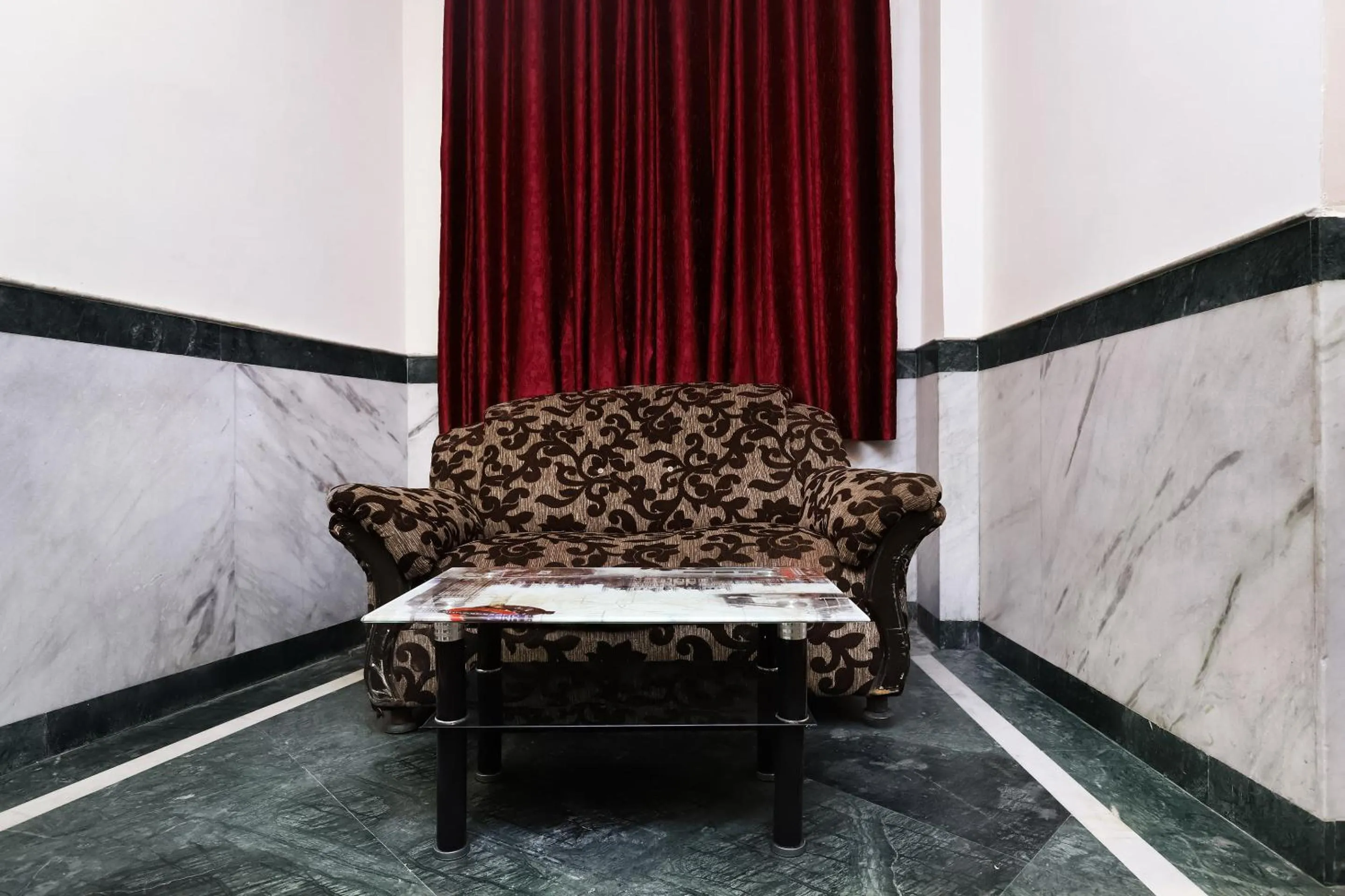 Living room in Collection O Ramji Grand Near Tdi Mall