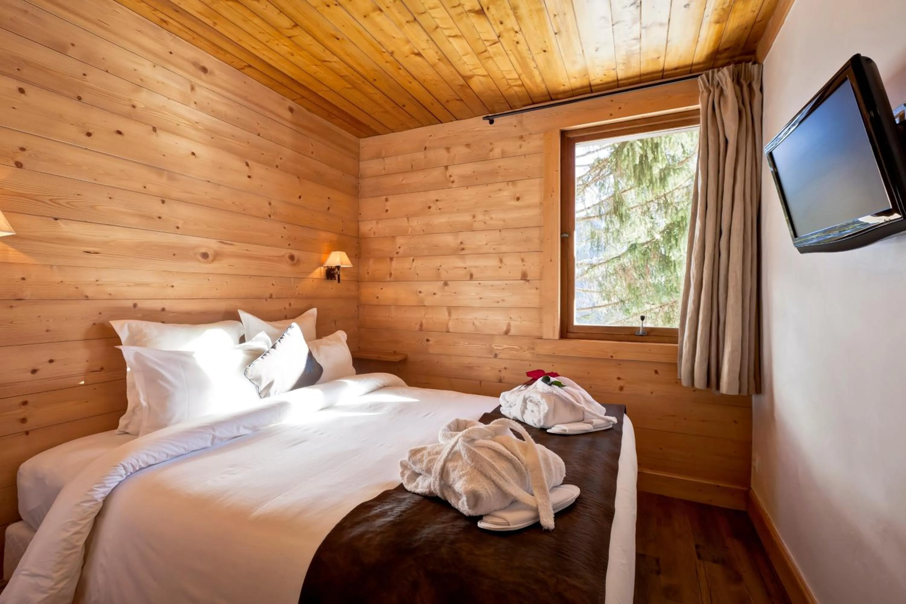 Bed in Hotel les Flocons