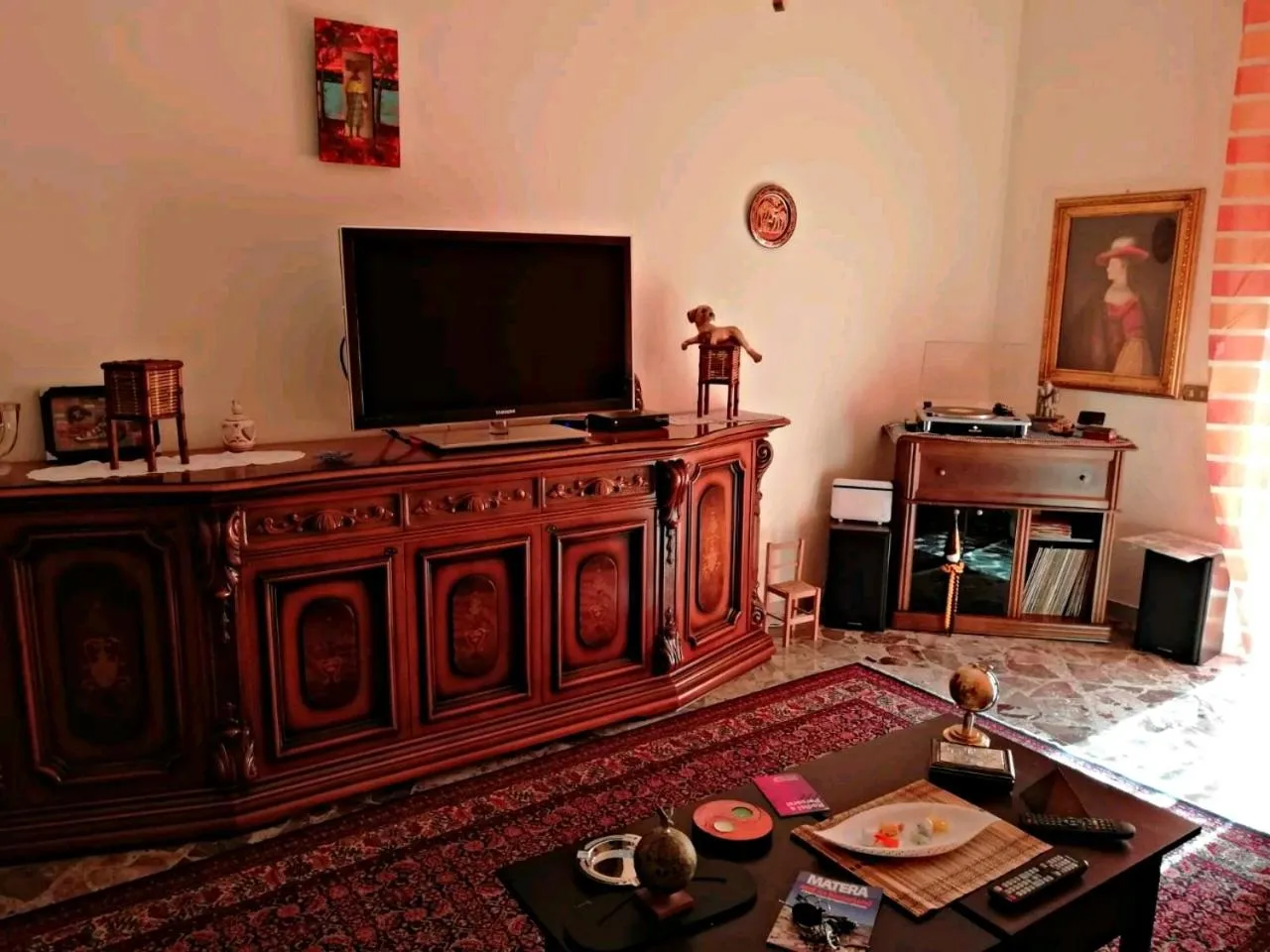 Communal lounge/ TV room in A Casa di Raffy