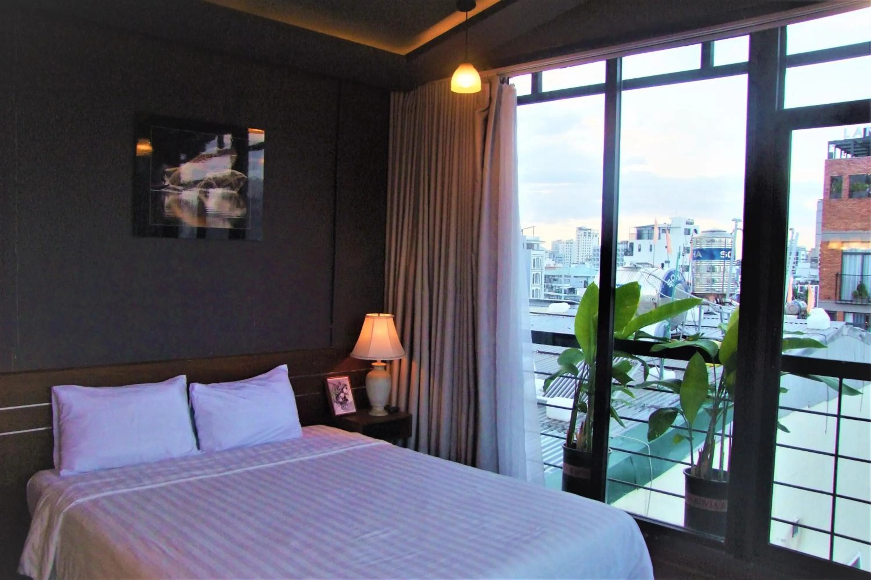 Bed in Oasis Hotel & Apartment