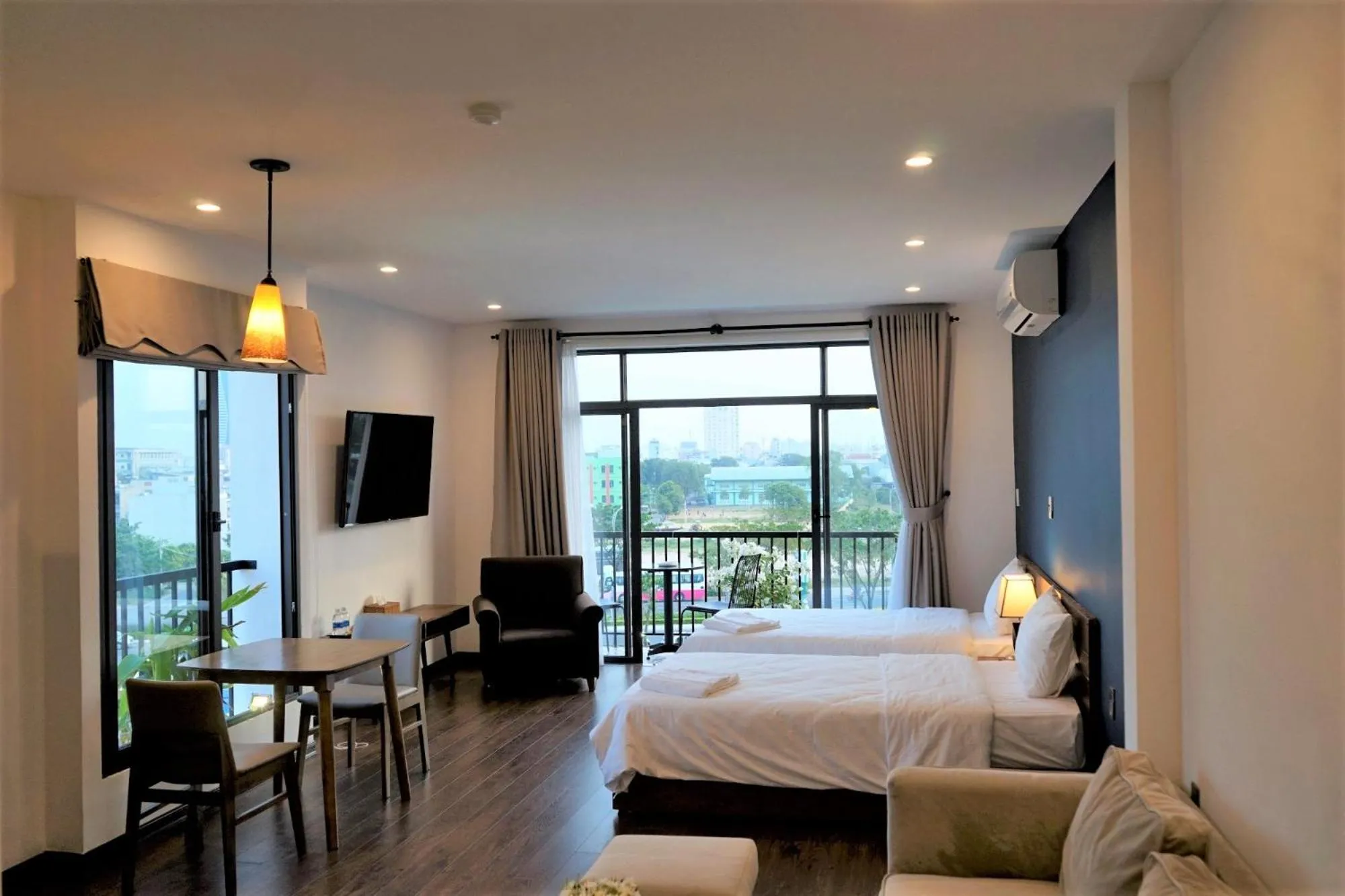 Bed in Oasis Hotel & Apartment