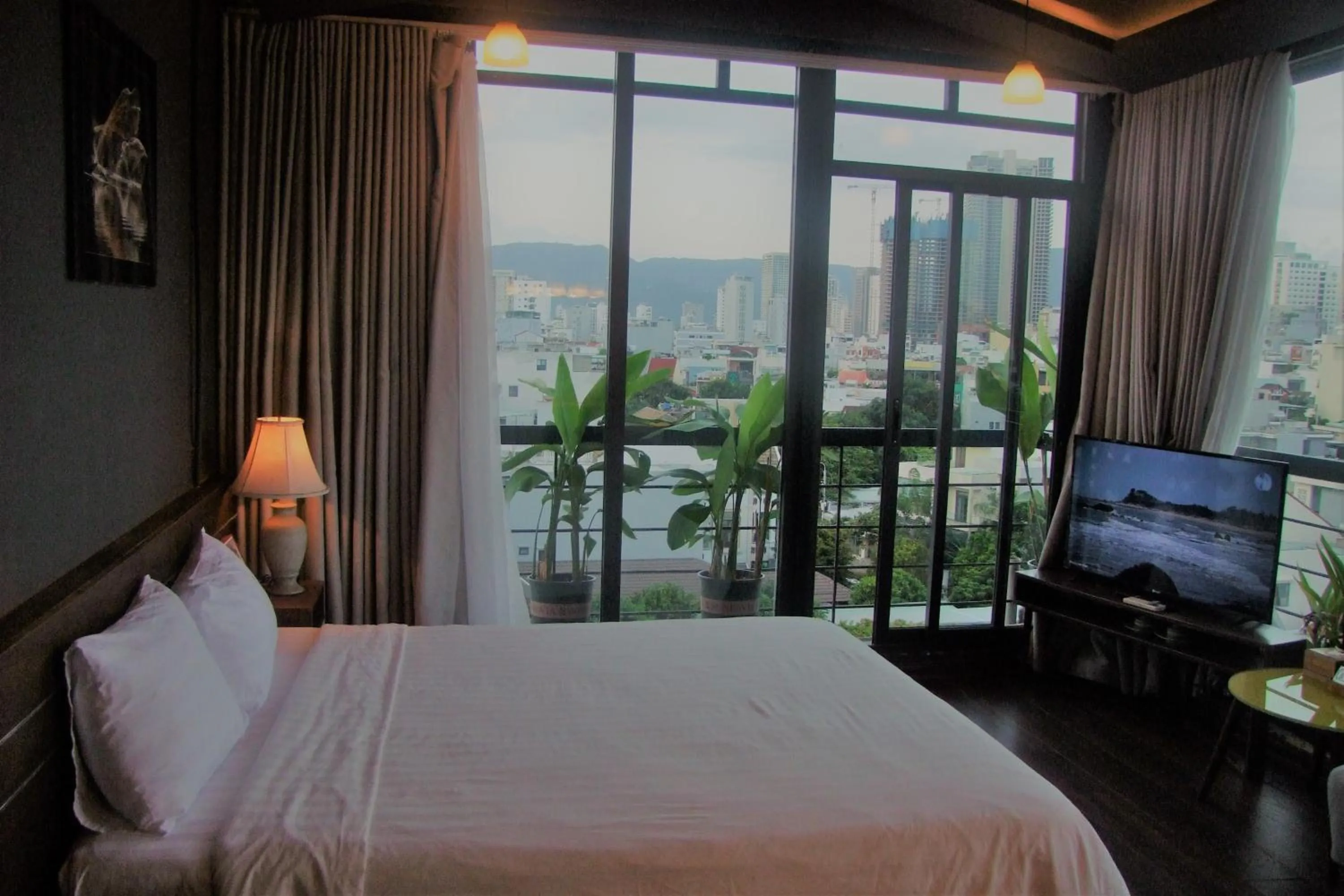 Bed in Oasis Hotel & Apartment