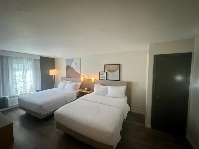 Queen Room with Two Queen Beds in Baymont by Wyndham Rock Springs Queen Room with Two Queen Beds in Baymont by Wyndham Rock Springs