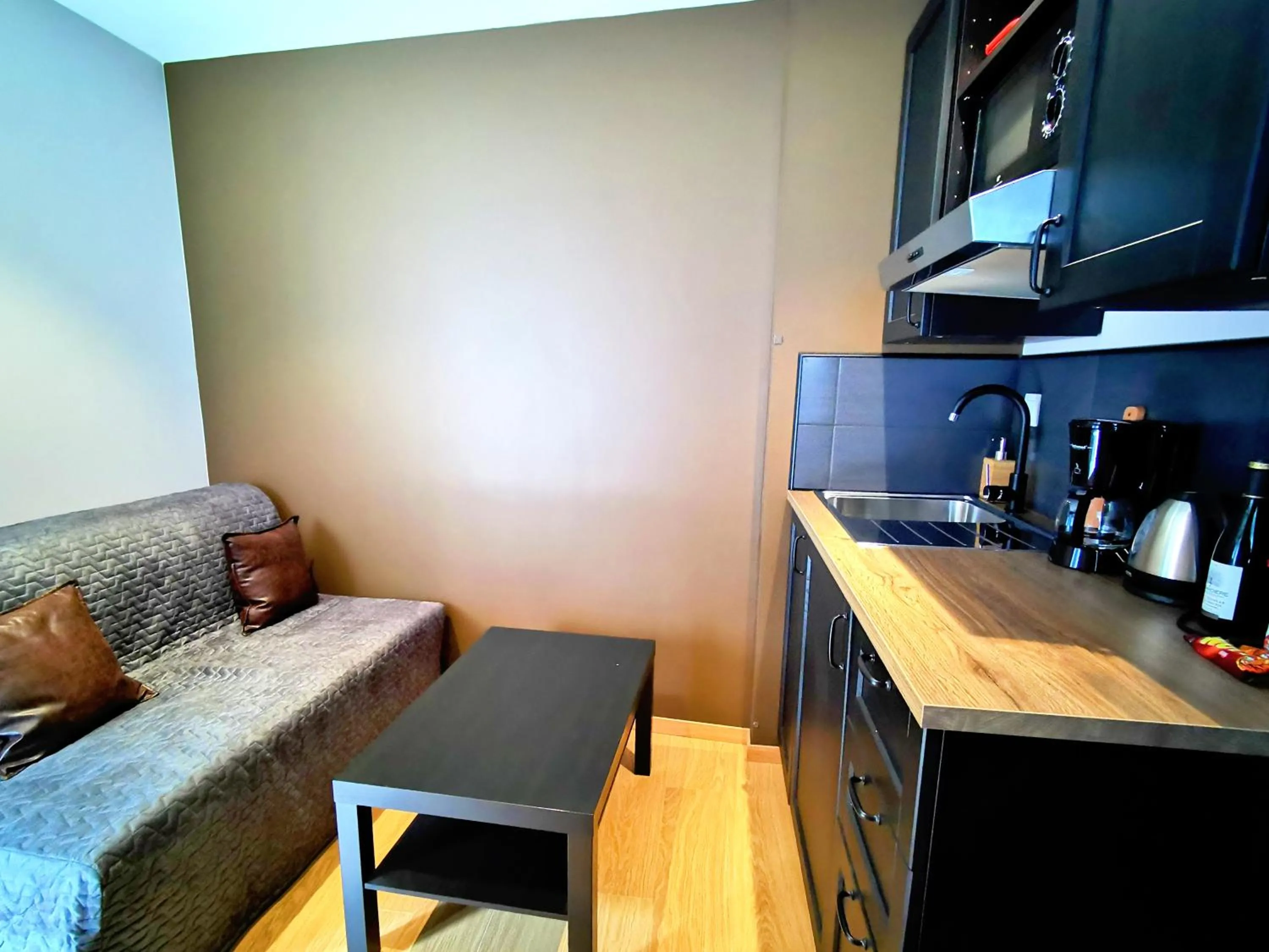 Kitchen or kitchenette in Appart Hotel Relax Spa